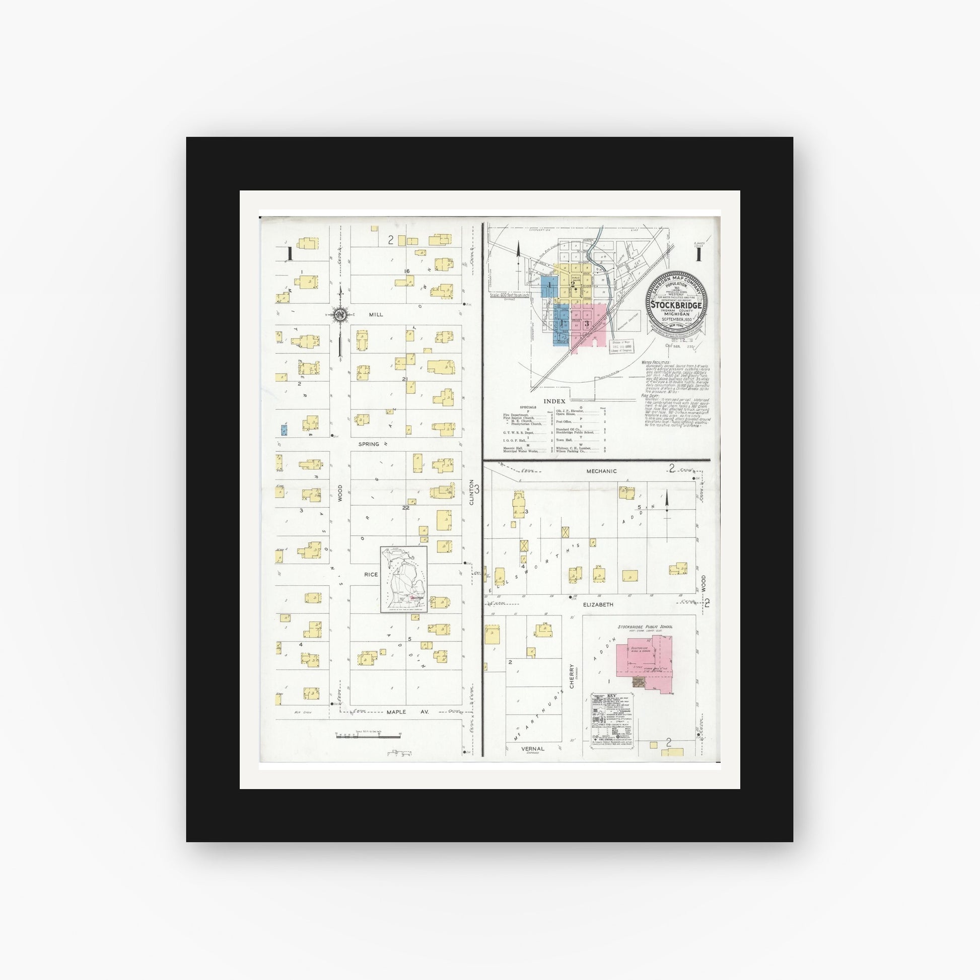 Old map wall art mockup — black gallery frame with white mat — Sanborn Fire Insurance Map from Stockbridge, Ingham County, Michigan (1930) - Complete Map Set