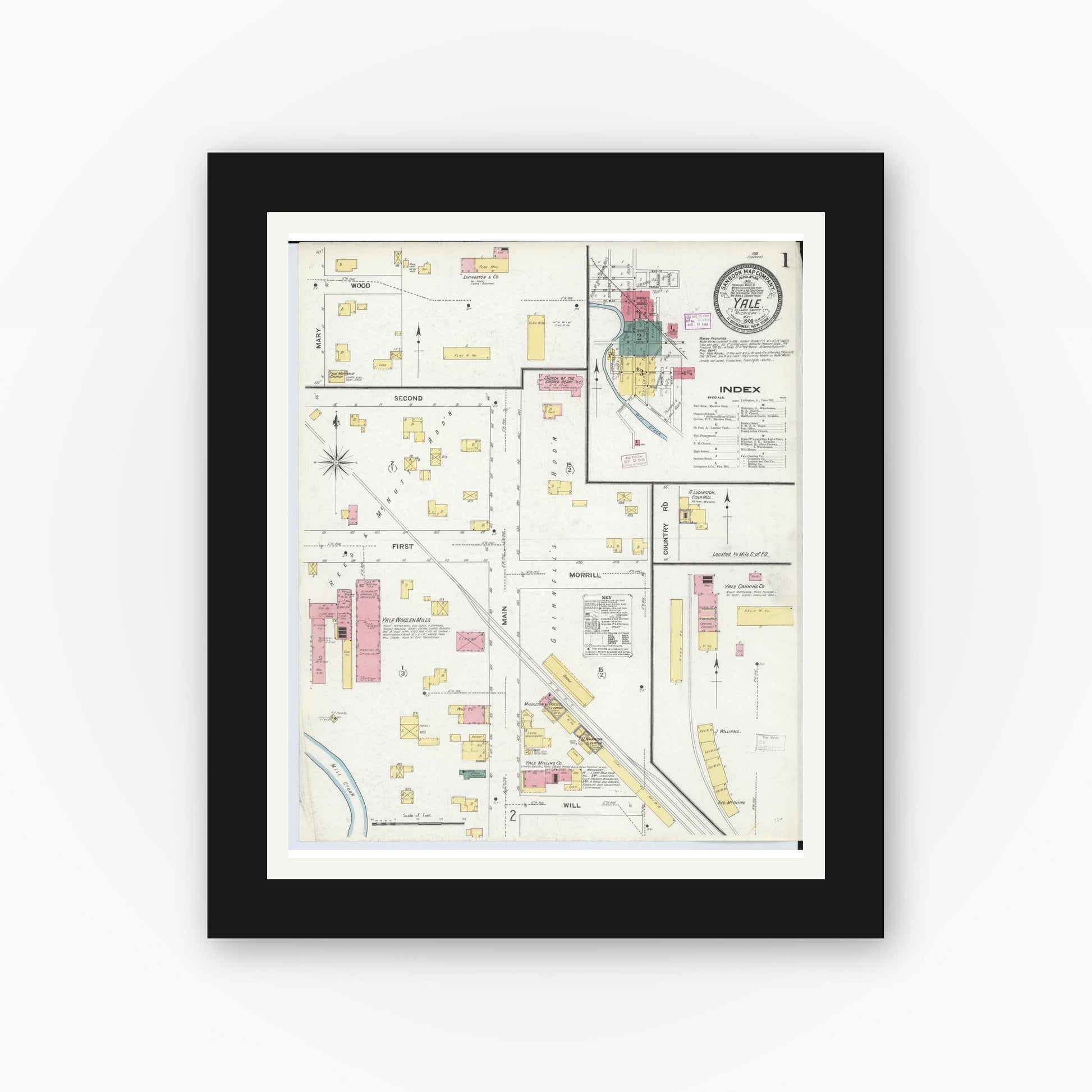 Old map wall art mockup — black gallery frame with white mat — Sanborn Fire Insurance Map from Yale, Saint Clair County, Michigan (1909), Sheet #0001