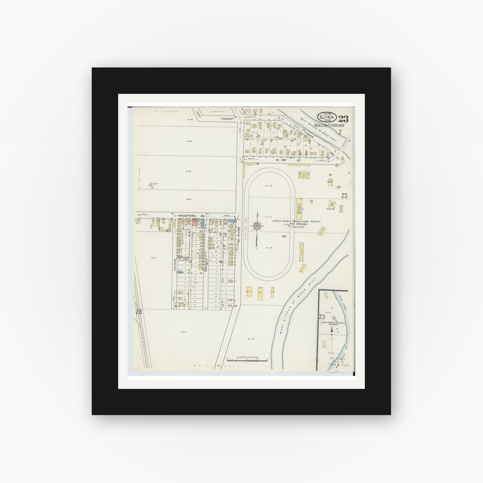 Old map wall art mockup — black gallery frame with white mat — Sanborn Fire Insurance Map from Elyria, Lorain County, Ohio (1915), Sheet #0023