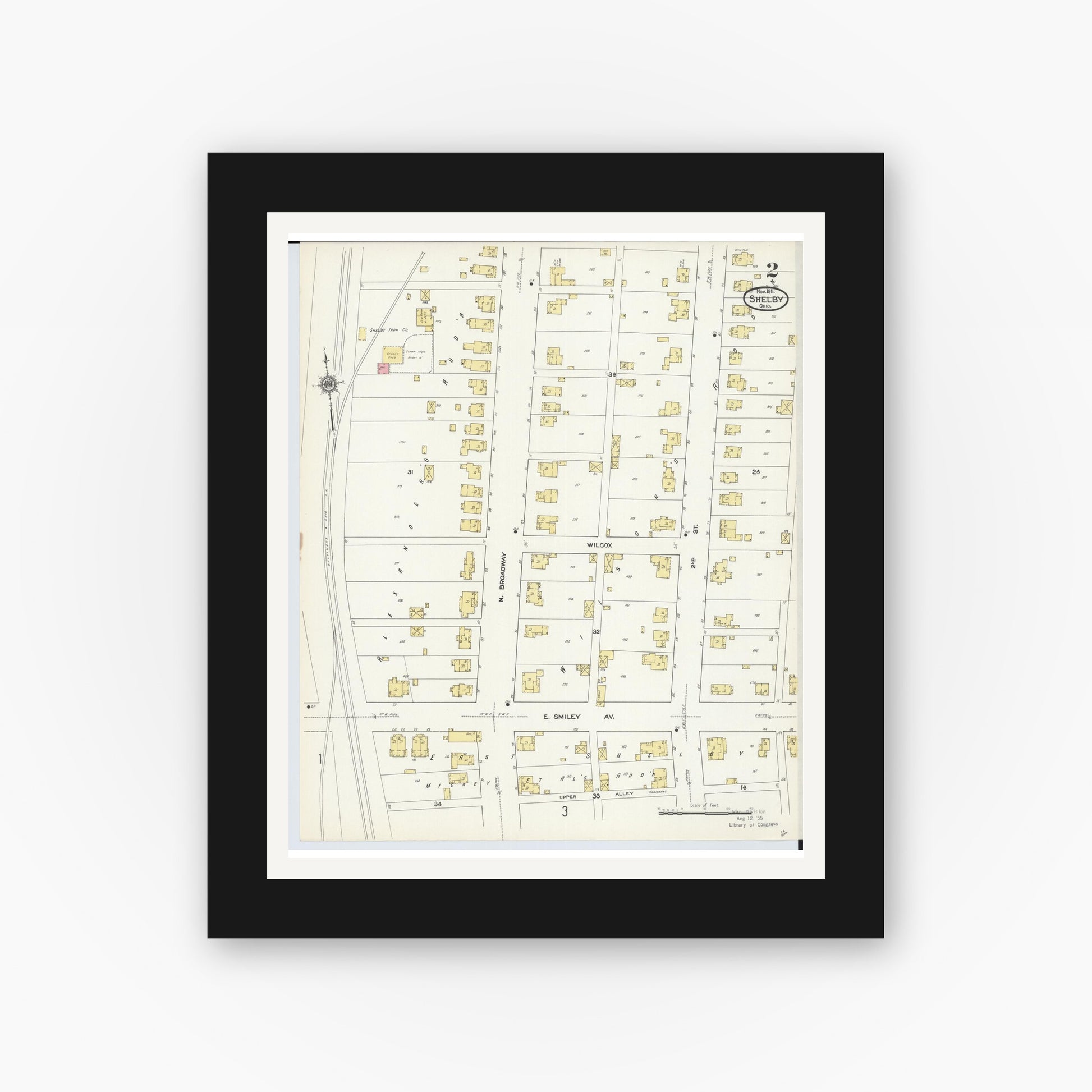 Old map wall art mockup — black gallery frame with white mat — Sanborn Fire Insurance Map from Shelby, Richland County, Ohio (1911), Sheet #0002