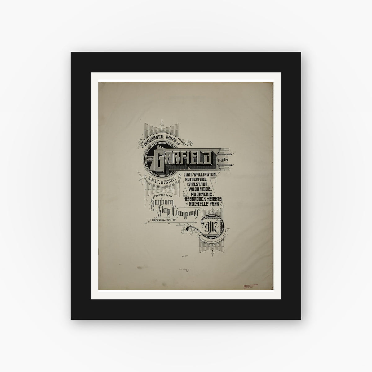Old map wall art mockup — black gallery frame with white mat — Sanborn Fire Insurance Map from Garfield, Bergen County, New Jersey (1917), Sheet #0001