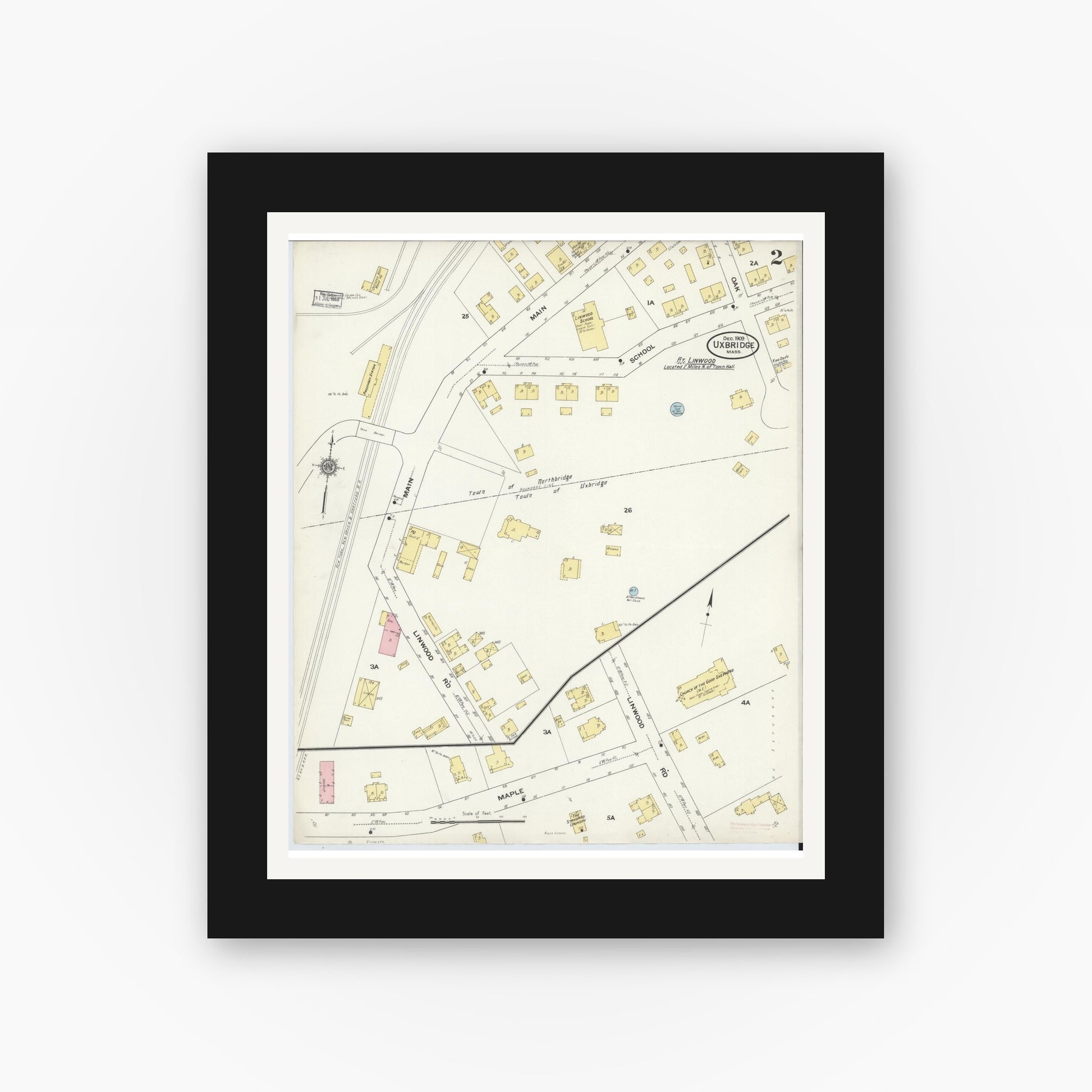 Old map wall art mockup — black gallery frame with white mat — Sanborn Fire Insurance Map from Uxbridge, Worcester County, Massachusetts (1909), Sheet #0002