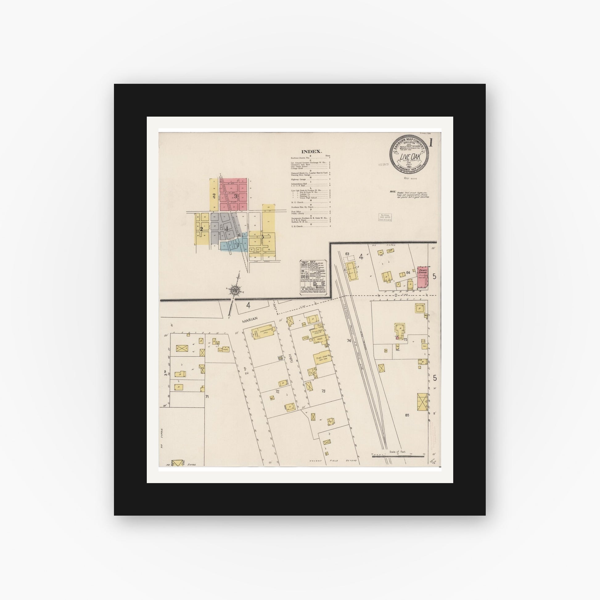 Old map wall art mockup — black gallery frame with white mat — Sanborn Fire Insurance Map from Live Oak, Sutter County, California (1921) - Complete Map Set
