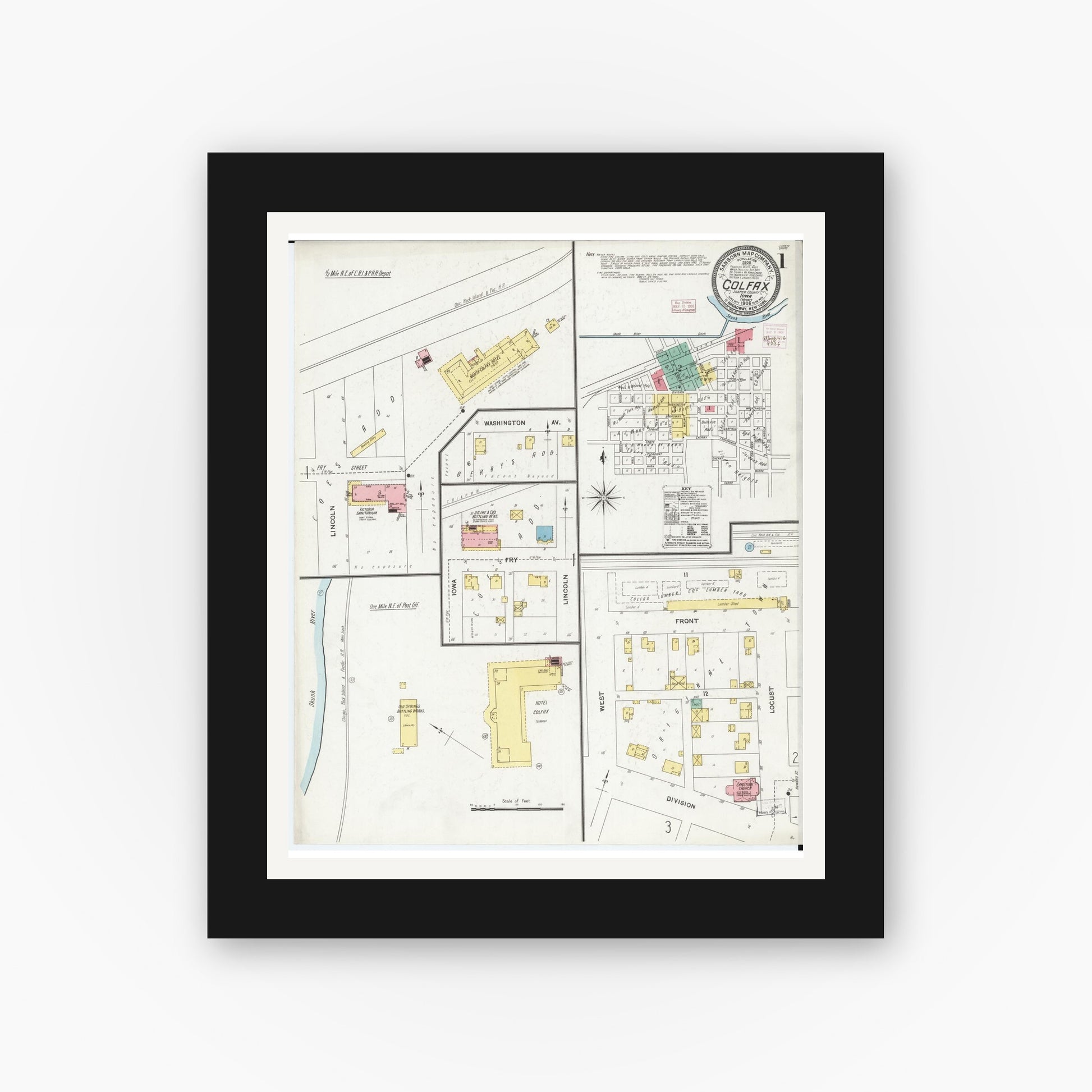 Old map wall art mockup — black gallery frame with white mat — Sanborn Fire Insurance Map from Colfax, Jasper County, Iowa (1906), Sheet #0001