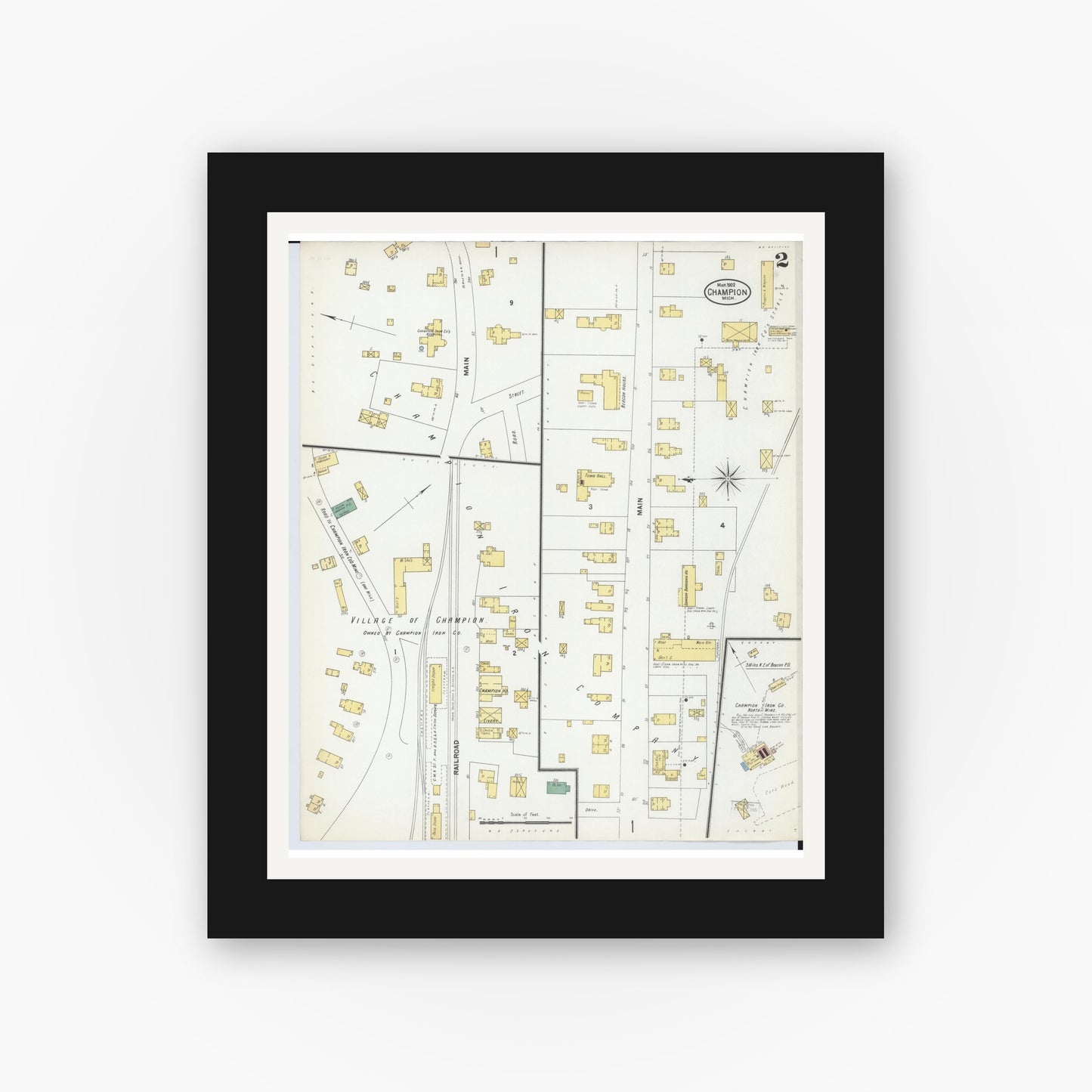 Old map wall art mockup — black gallery frame with white mat — Sanborn Fire Insurance Map from Champion, Marquette County, Michigan (1902), Sheet #0002