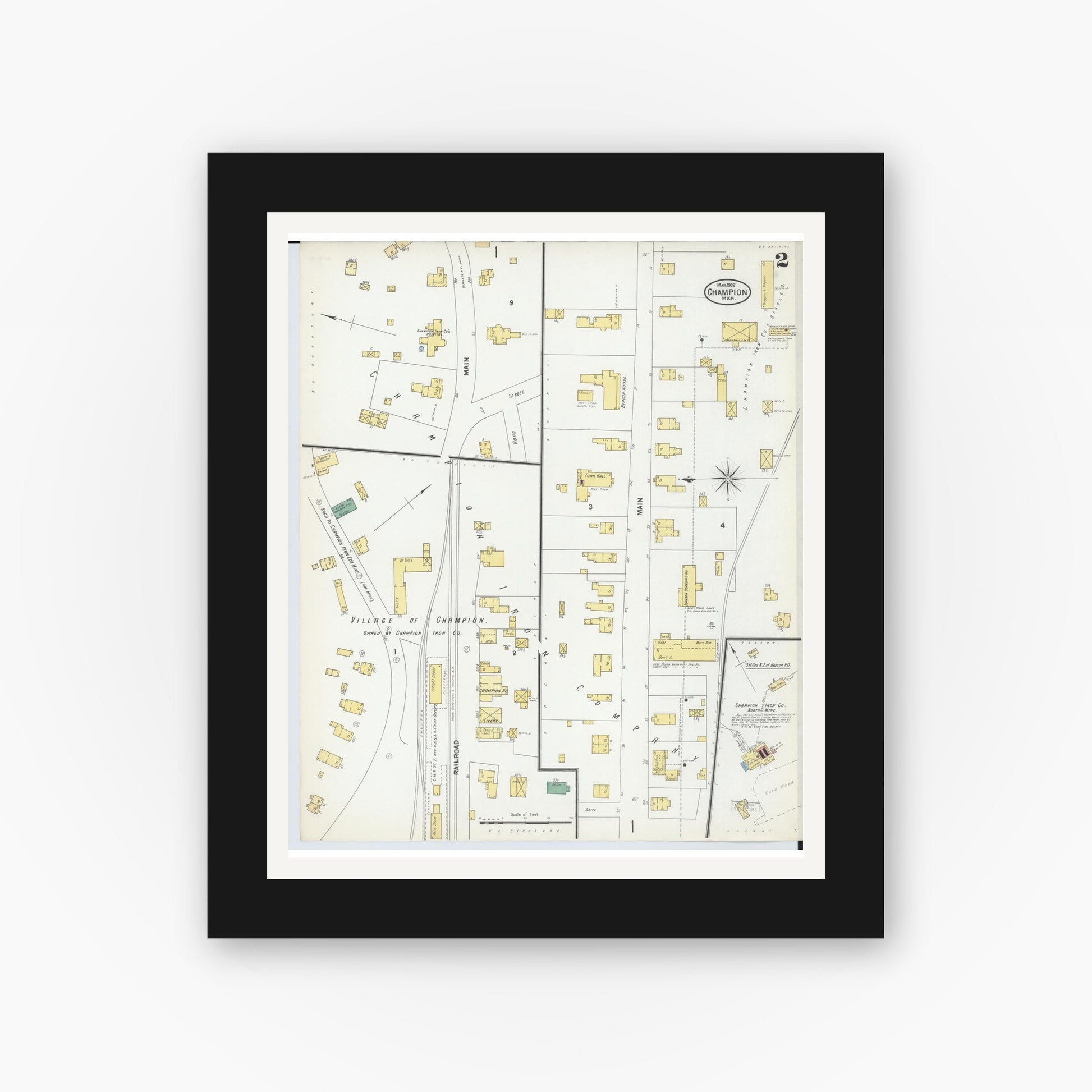 Old map wall art mockup — black gallery frame with white mat — Sanborn Fire Insurance Map from Champion, Marquette County, Michigan (1902), Sheet #0002