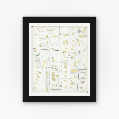 Old map wall art mockup — black gallery frame with white mat — Sanborn Fire Insurance Map from Champion, Marquette County, Michigan (1902), Sheet #0002