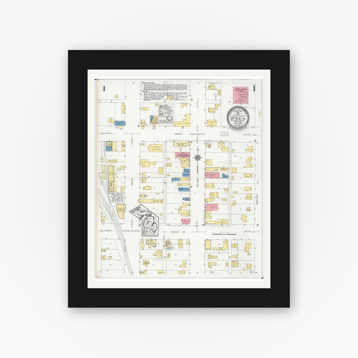Old map wall art mockup — black gallery frame with white mat — Sanborn Fire Insurance Map from Mcbain, Missaukee County, Michigan (1929), Sheet #0001