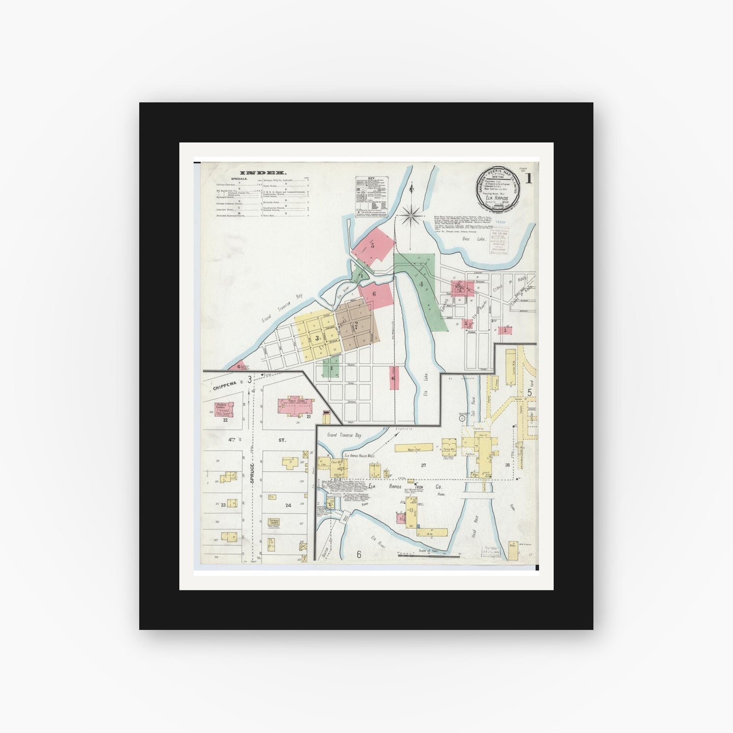 Old map wall art mockup — black gallery frame with white mat — Sanborn Fire Insurance Map from Elk Rapids, Antrim County, Michigan (1900) - Complete Map Set