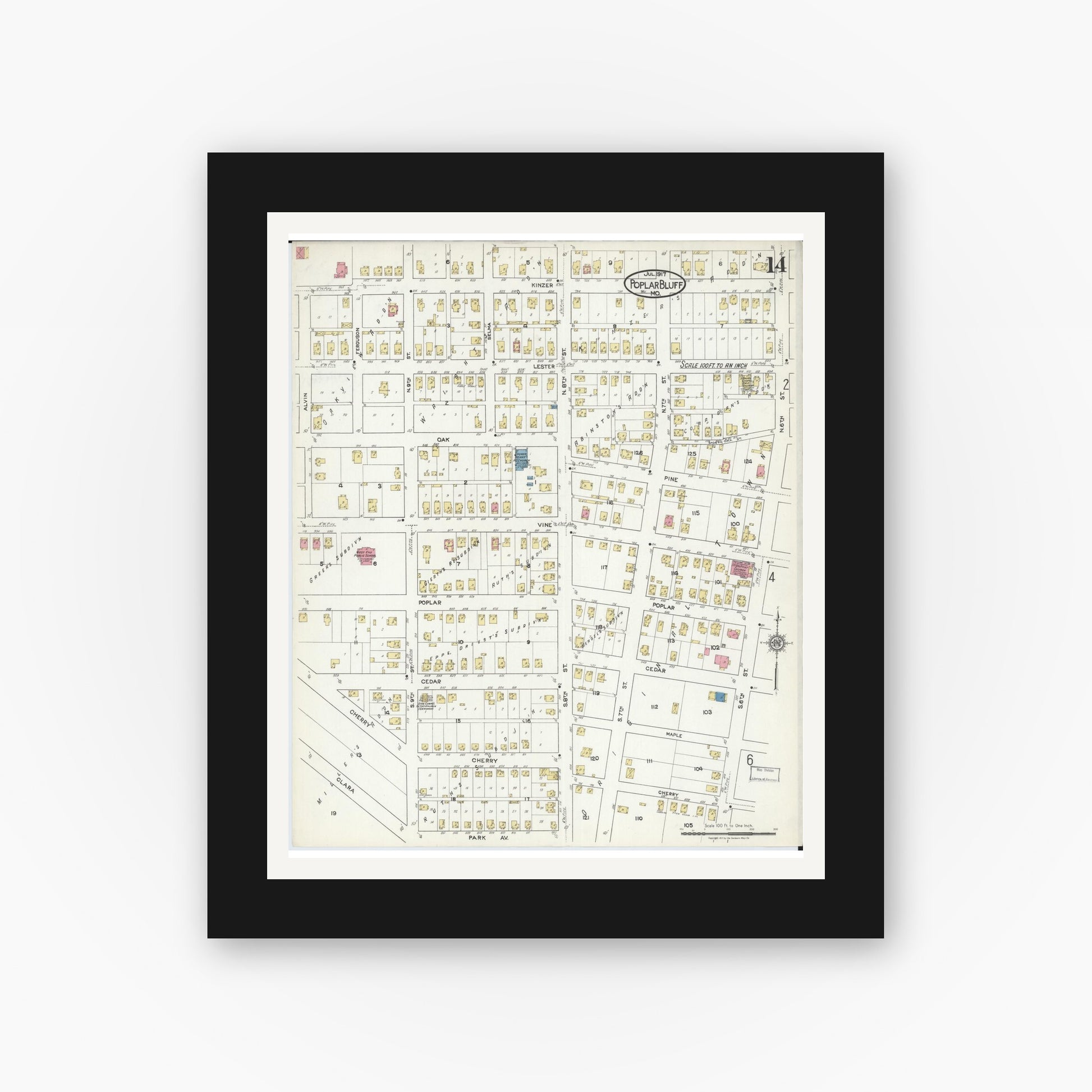 Old map wall art mockup — black gallery frame with white mat — Sanborn Fire Insurance Map from Poplar Bluff, Butler County, Missouri (1917), Sheet #0014