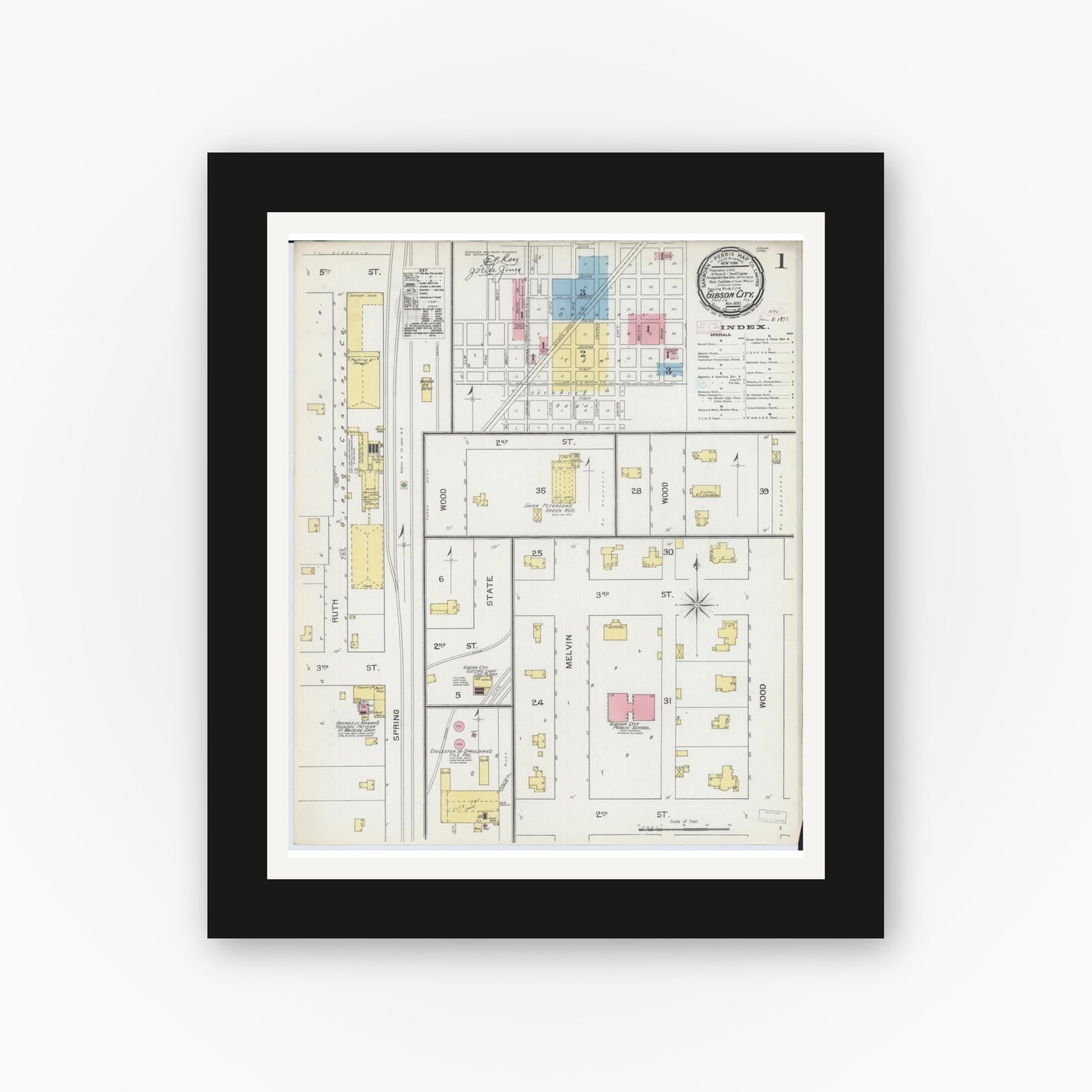 Old map wall art mockup — black gallery frame with white mat — Sanborn Fire Insurance Map from Gibson City, Ford County, Illinois (1892), Sheet #0001