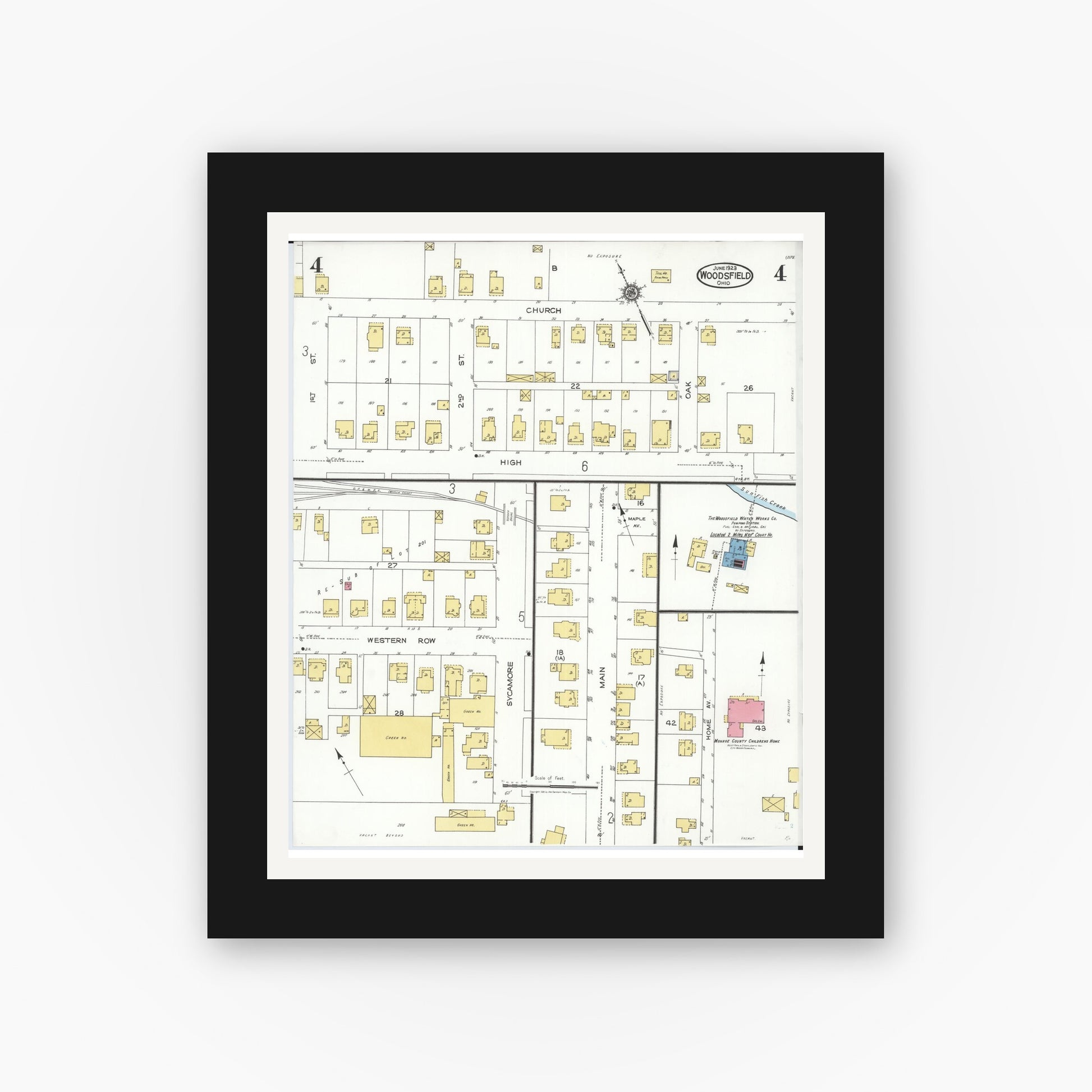Old map wall art mockup — black gallery frame with white mat — Sanborn Fire Insurance Map from Woodsfield, Monroe County, Ohio (1923), Sheet #0004