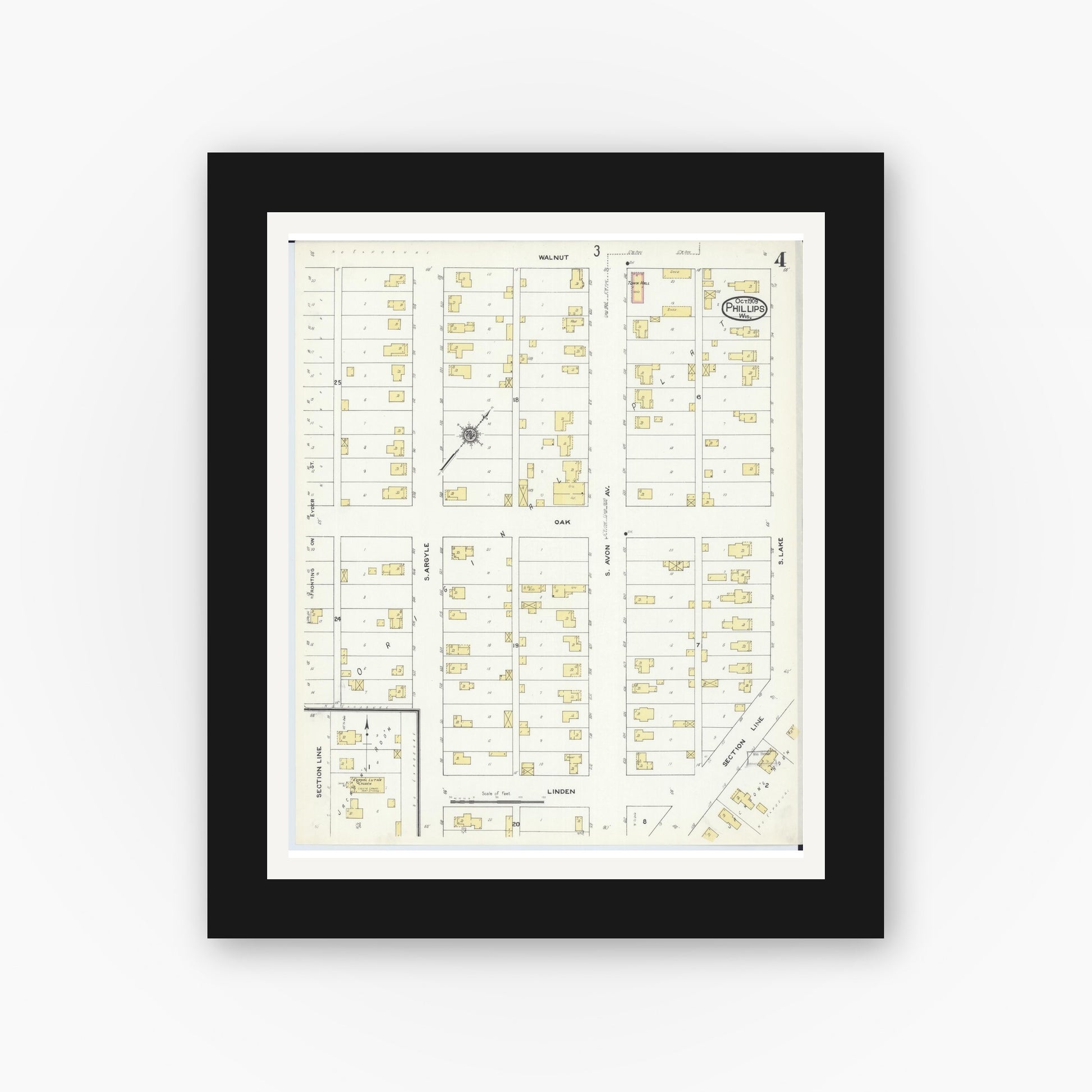 Old map wall art mockup — black gallery frame with white mat — Sanborn Fire Insurance Map from Phillips, Price County, Wisconsin (1909), Sheet #0004