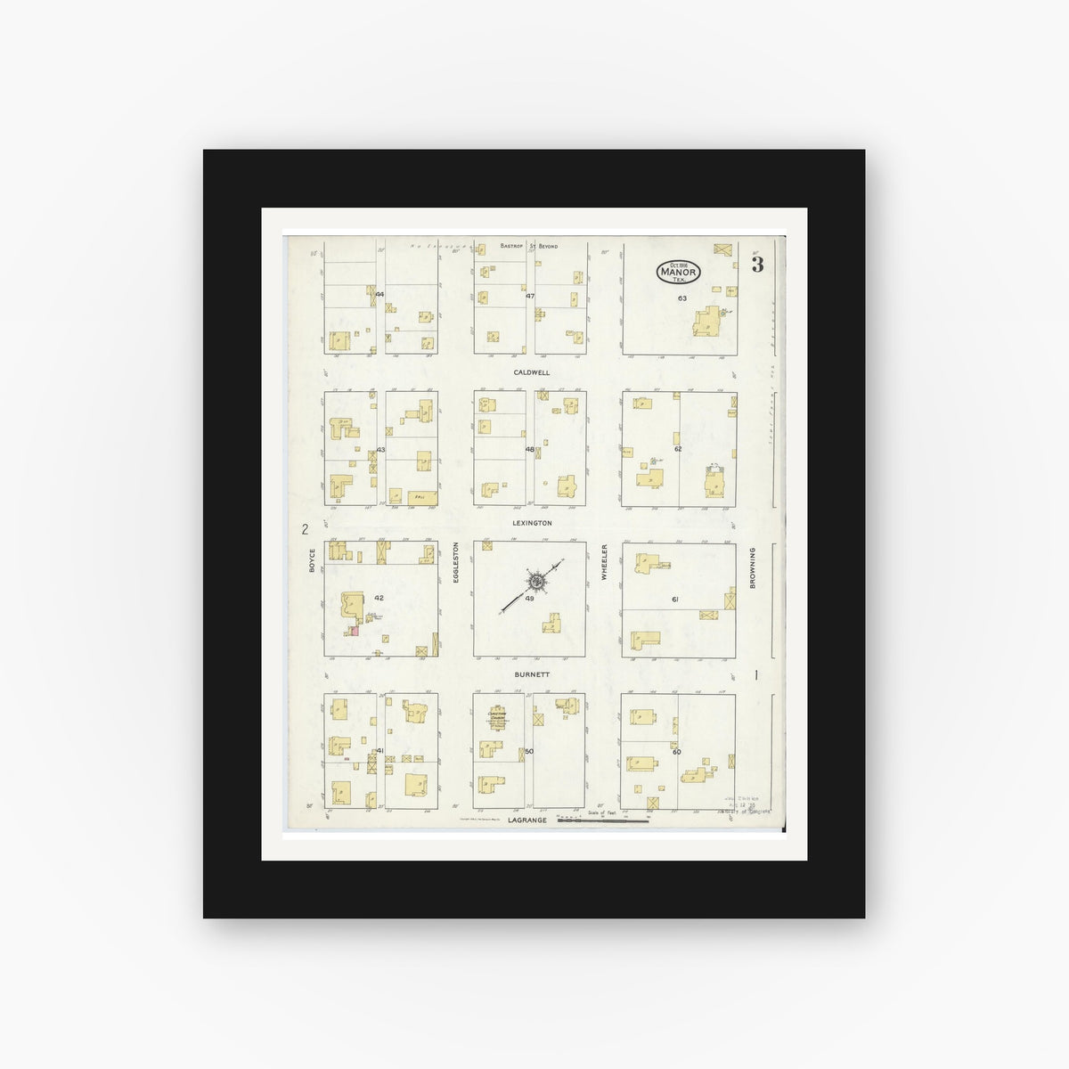 Old map wall art mockup — black gallery frame with white mat — Sanborn Fire Insurance Map from Manor, Travis County, Texas (1916), Sheet #0003