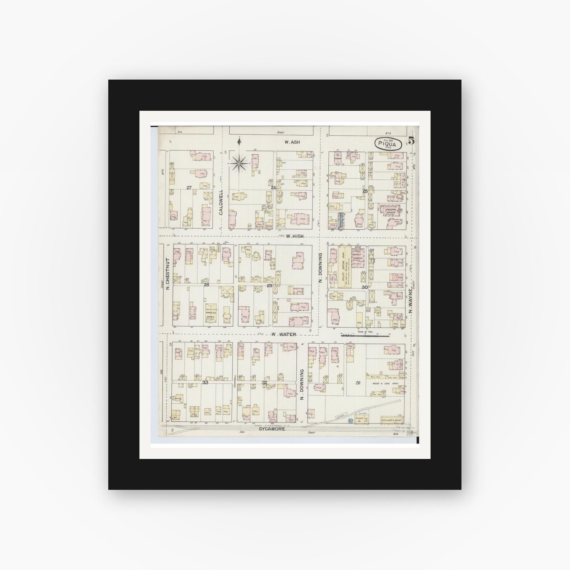 Old map wall art mockup — black gallery frame with white mat — Sanborn Fire Insurance Map from Piqua, Miami County, Ohio (1887), Sheet #0005