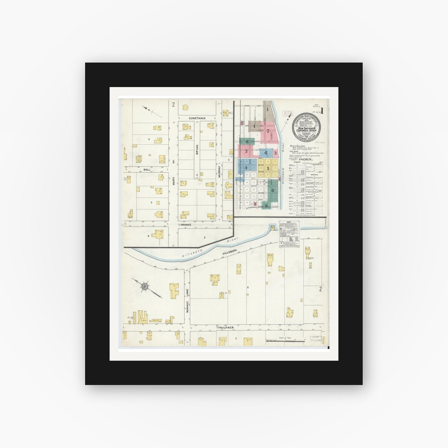 Old map wall art mockup — black gallery frame with white mat — Sanborn Fire Insurance Map from New Smyrna, Valusia County, Florida (1912), Sheet #0001