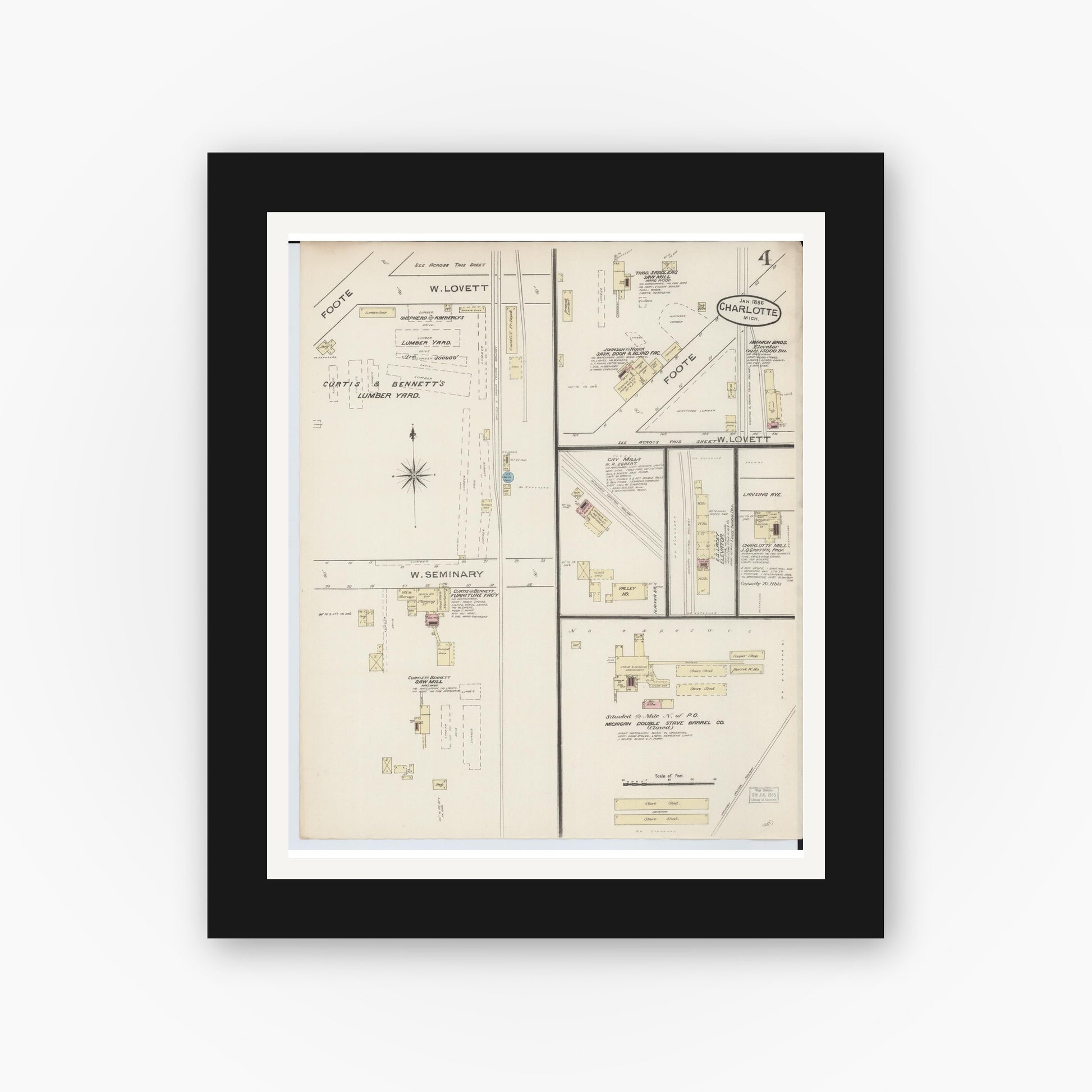 Old map wall art mockup — black gallery frame with white mat — Sanborn Fire Insurance Map from Charlotte, Eaton County, Michigan (1886), Sheet #0004