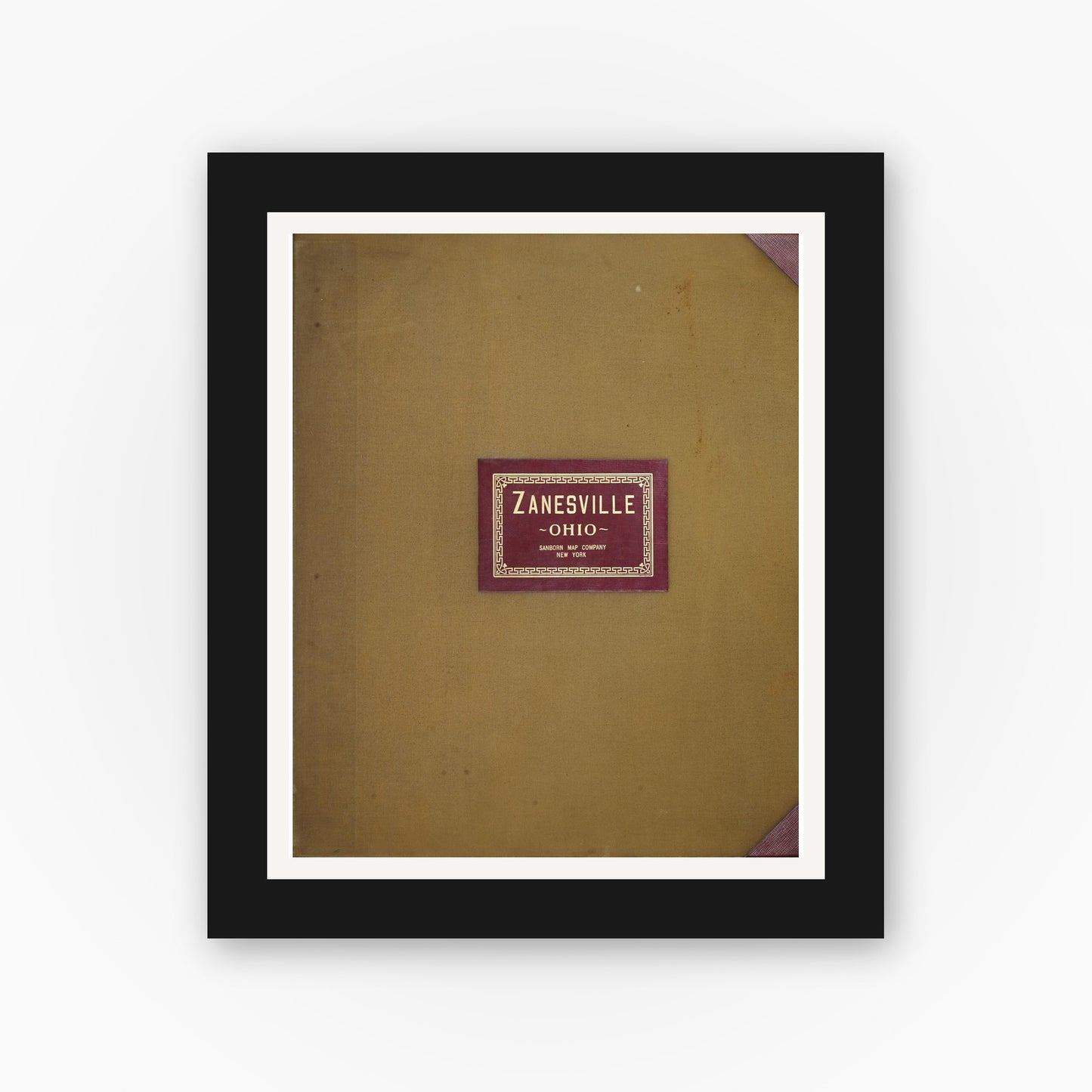 Old map wall art mockup — black gallery frame with white mat — Sanborn Fire Insurance Map from Zanesville, Muskingum County, Ohio (1950), Sheet #0001
