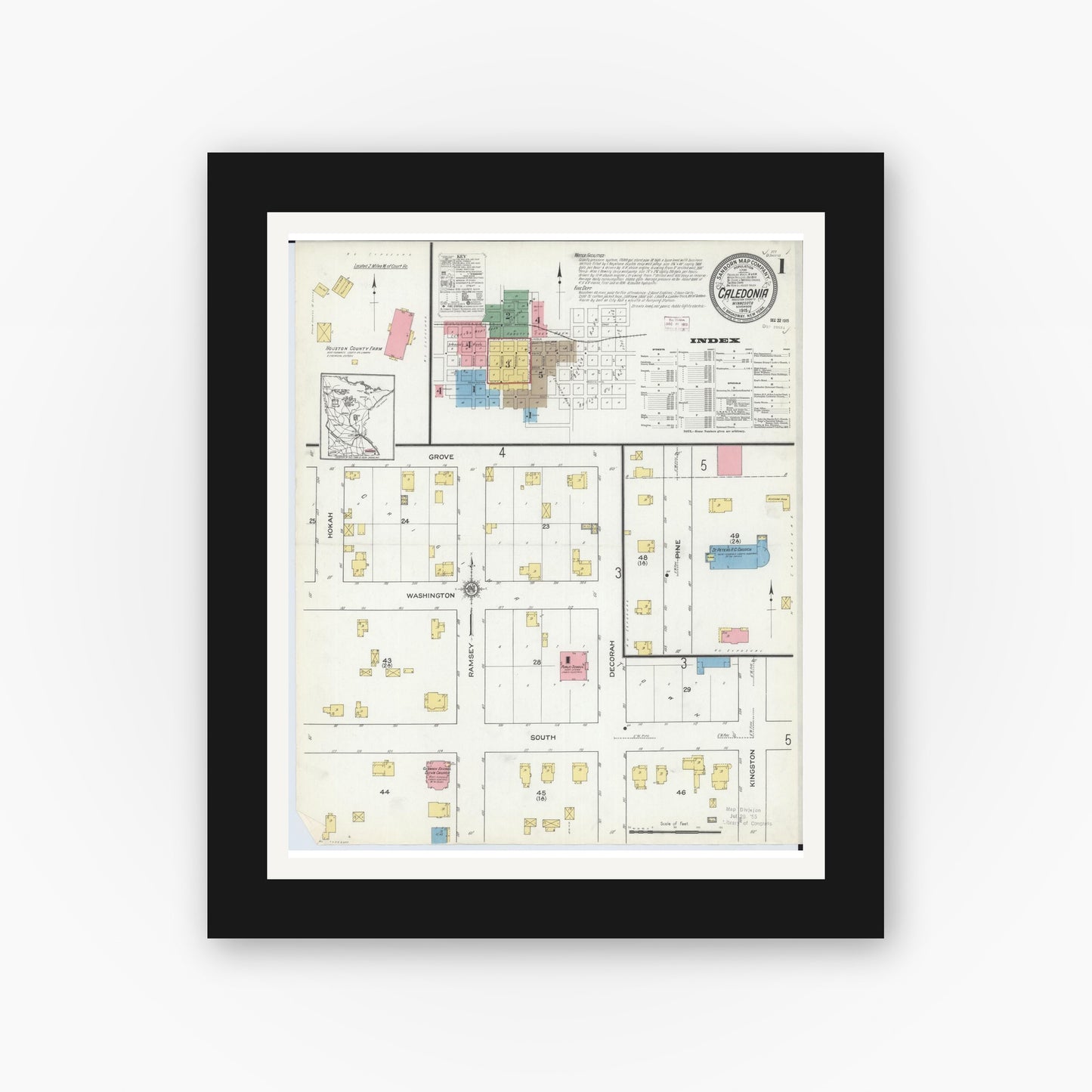 Old map wall art mockup — black gallery frame with white mat — Sanborn Fire Insurance Map from Caledonia, Houston County, Minnesota (1915), Sheet #0001