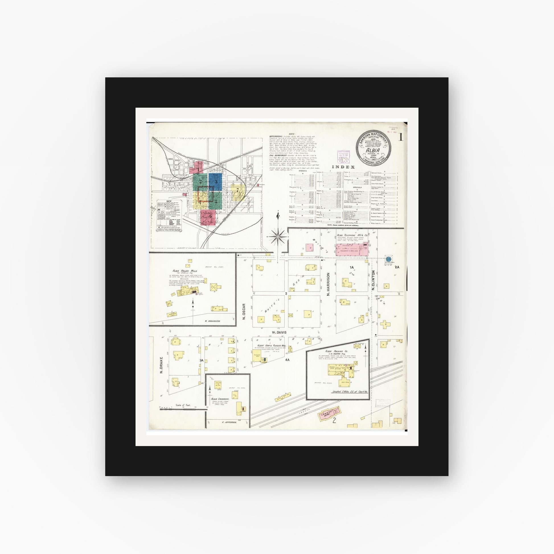Old map wall art mockup — black gallery frame with white mat — Sanborn Fire Insurance Map from Albia, Monroe County, Iowa (1907) â€” Complete Set