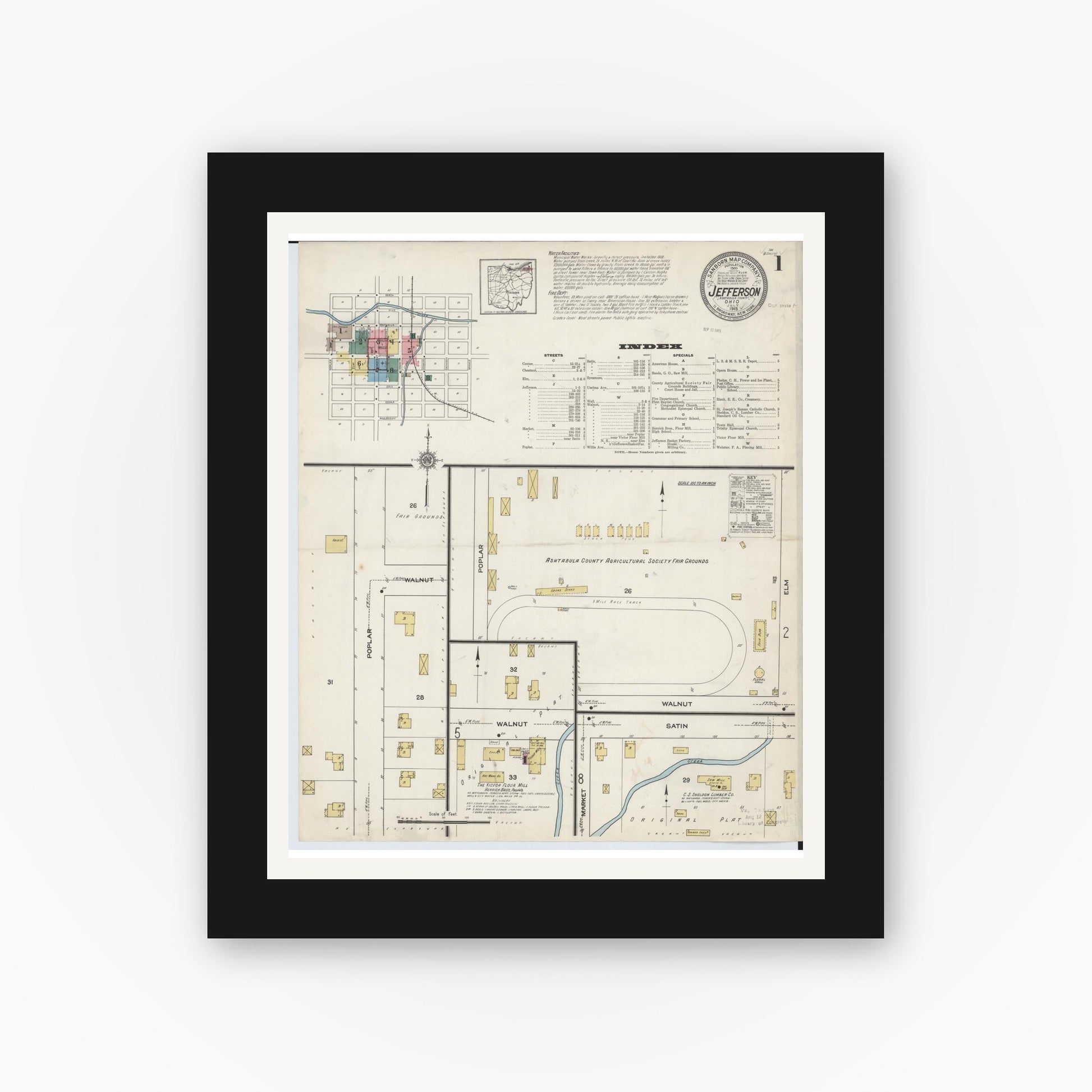 Old map wall art mockup — black gallery frame with white mat — Sanborn Fire Insurance Map from Jefferson, Ashtabula County, Ohio (1915), Sheet #0001