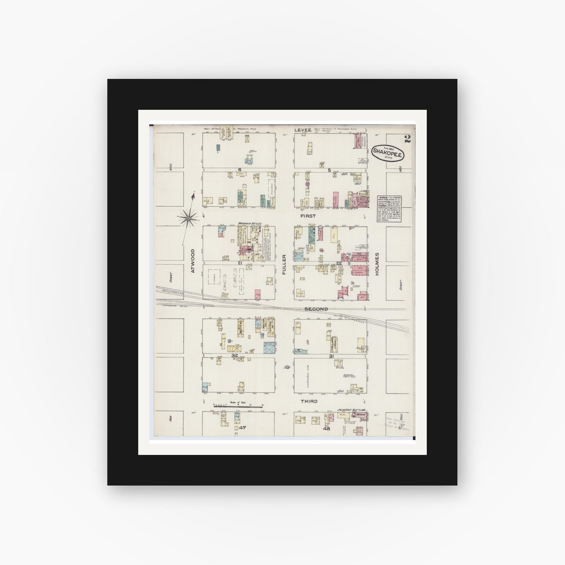 Old map wall art mockup — black gallery frame with white mat — Sanborn Fire Insurance Map from Shakopee, Scott County, Minnesota (1884), Sheet #0002