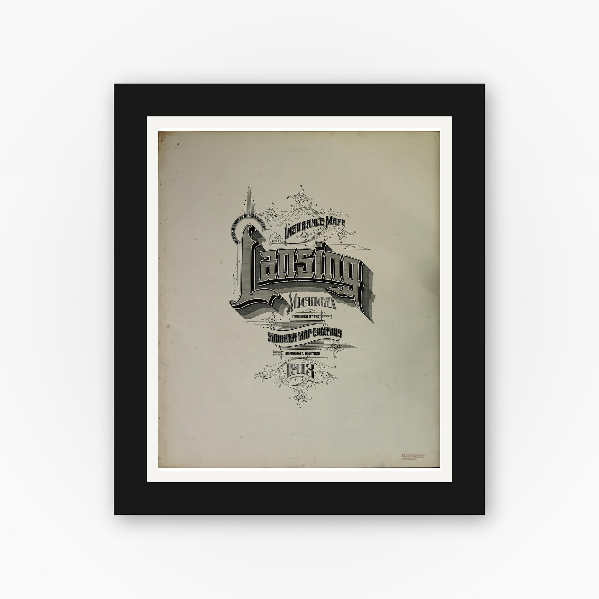 Old map wall art mockup — black gallery frame with white mat — Sanborn Fire Insurance Map from Lansing, Ingham County, Michigan (1913), Sheet #0001
