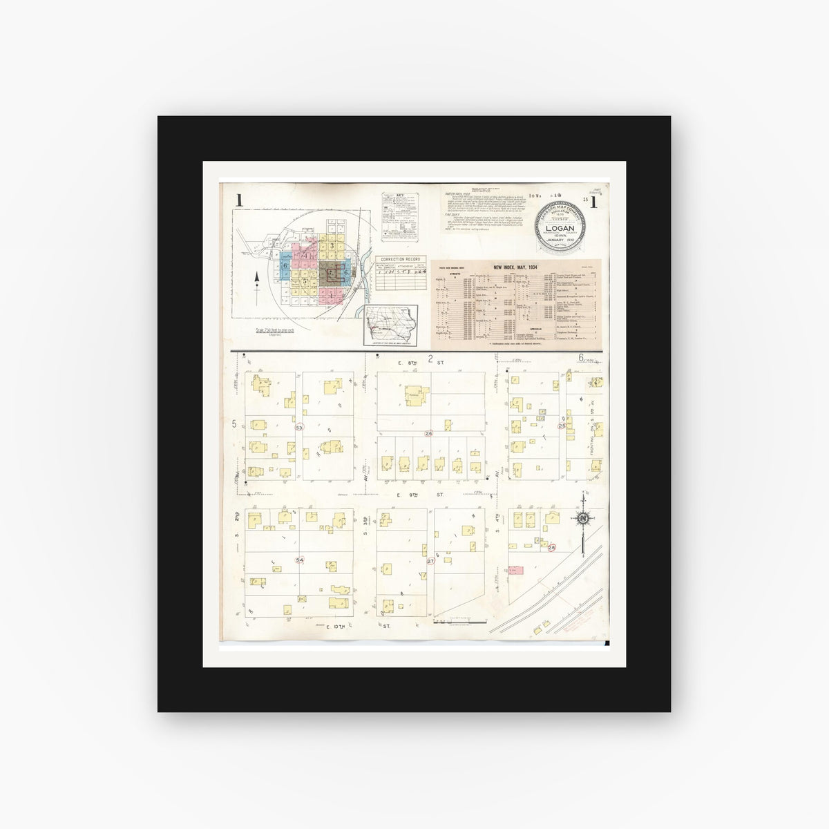 Old map wall art mockup — black gallery frame with white mat — Sanborn Fire Insurance Map from Logan, Harrison County, Iowa (1934) â€” Complete Set