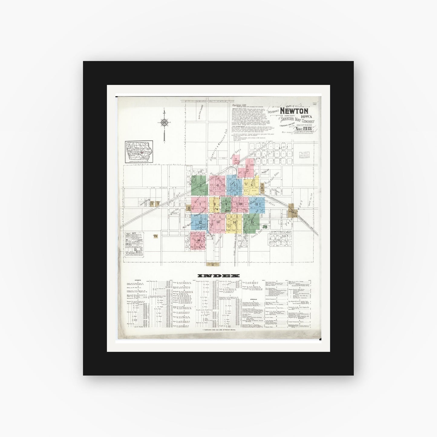 Old map wall art mockup — black gallery frame with white mat — Sanborn Fire Insurance Map from Newton, Jasper County, Iowa (1918) â€” Complete Set