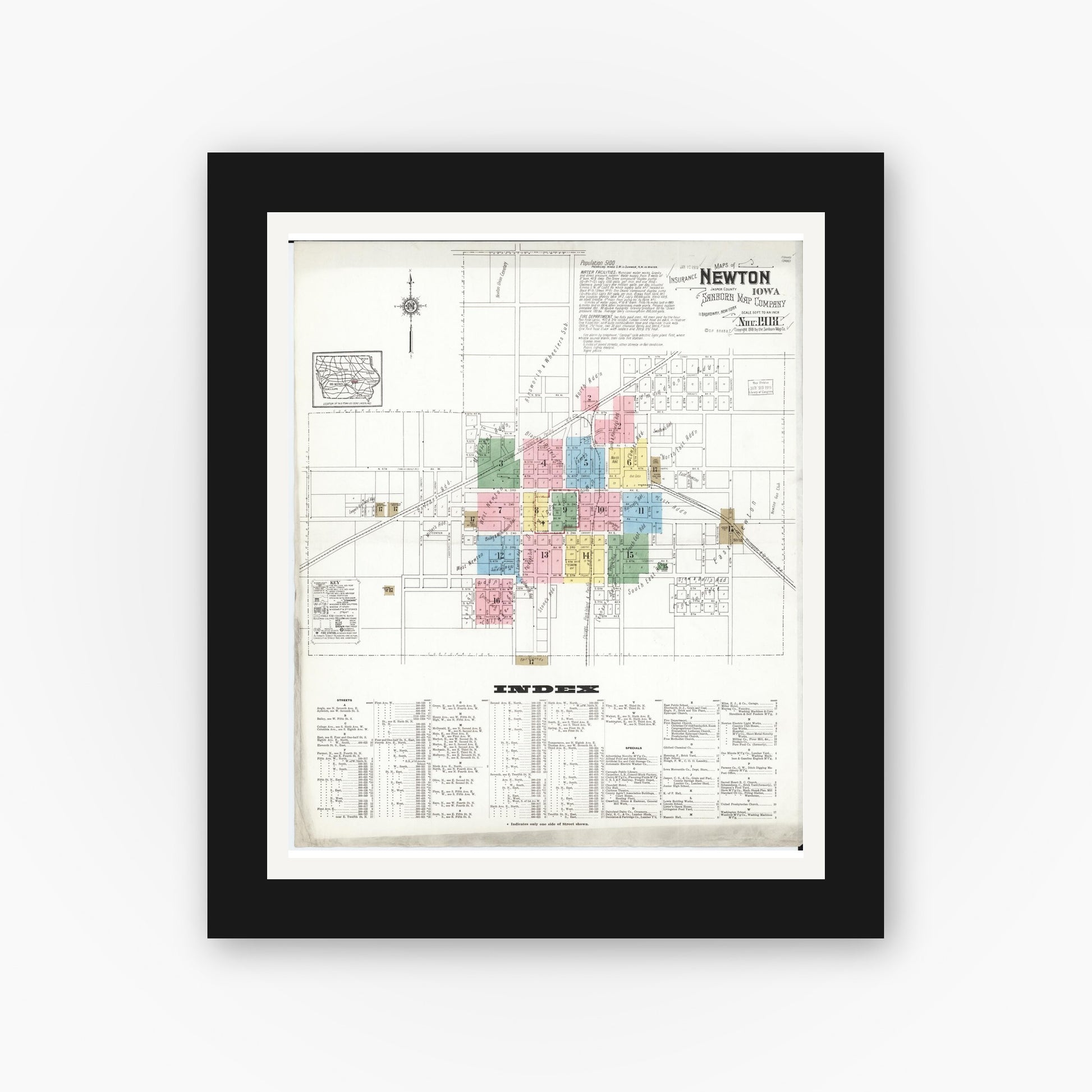 Old map wall art mockup — black gallery frame with white mat — Sanborn Fire Insurance Map from Newton, Jasper County, Iowa (1918) â€” Complete Set
