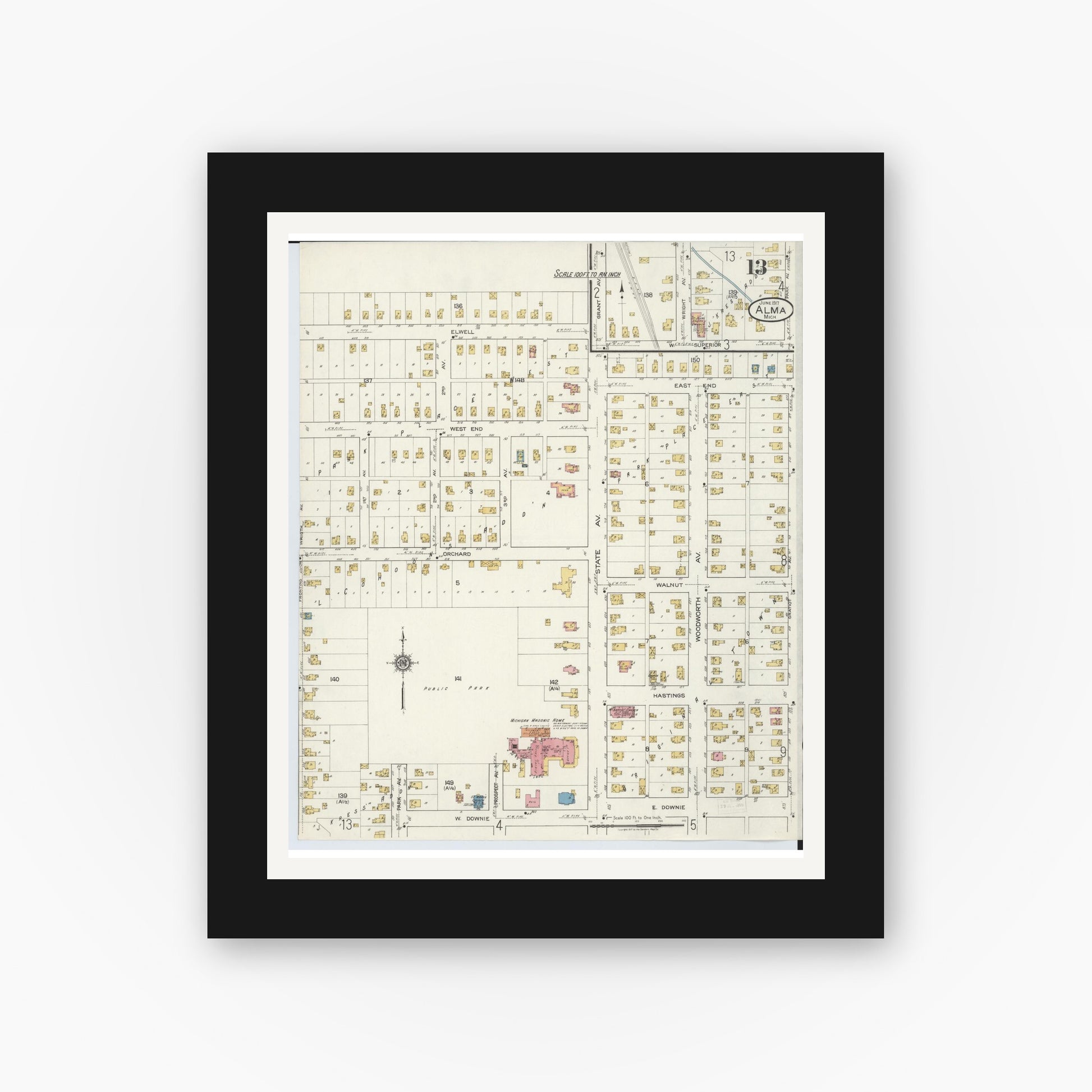 Old map wall art mockup — black gallery frame with white mat — Sanborn Fire Insurance Map from Alma, Gratiot County, Michigan (1917), Sheet #0013