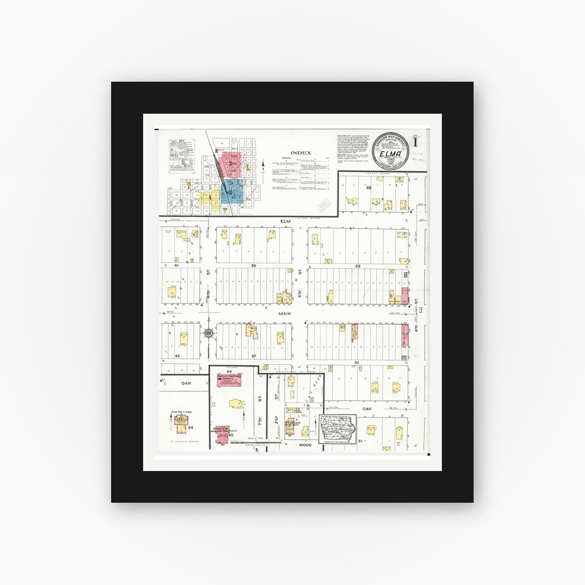 Old map wall art mockup — black gallery frame with white mat — Sanborn Fire Insurance Map from Elma, Howard County, Iowa (1920) â€” Complete Set
