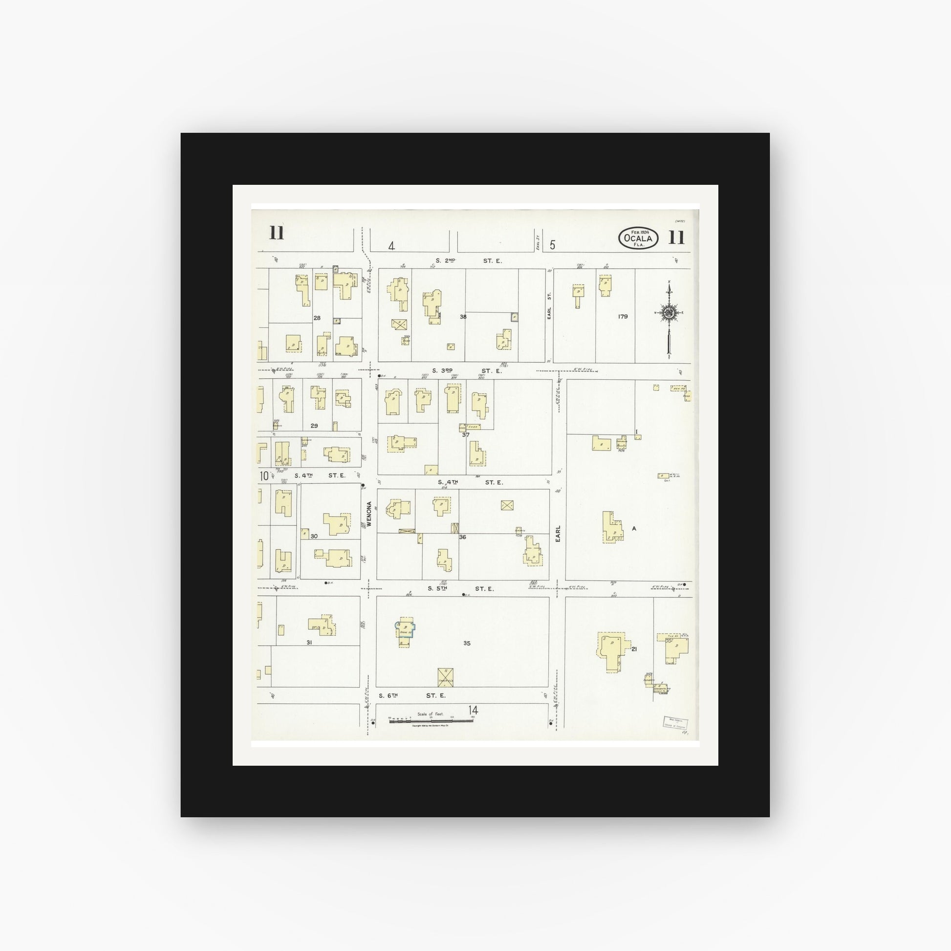 Old map wall art mockup — black gallery frame with white mat — Sanborn Fire Insurance Map from Ocala, Marion County, Florida (1924), Sheet #0011