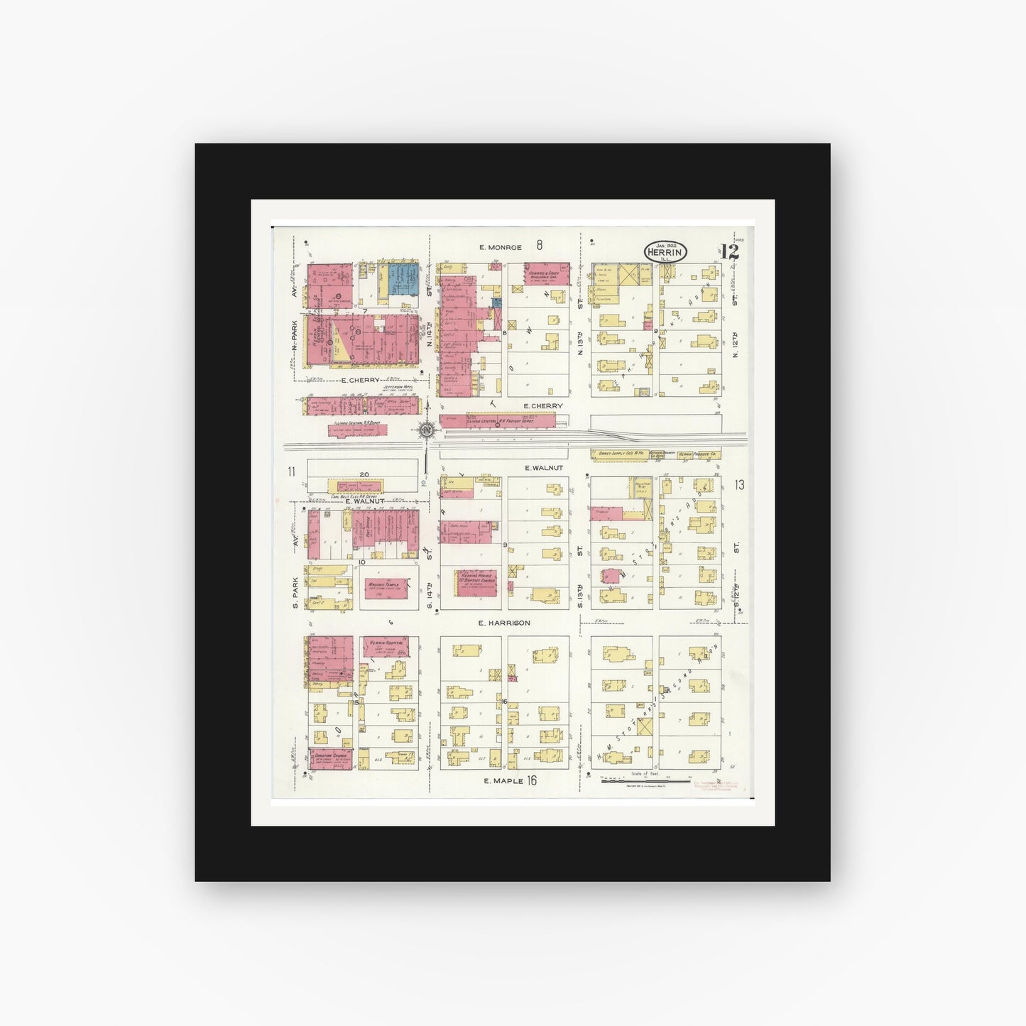 Old map wall art mockup — black gallery frame with white mat — Sanborn Fire Insurance Map from Herrin, Williamson County, Illinois (1922), Sheet #0012