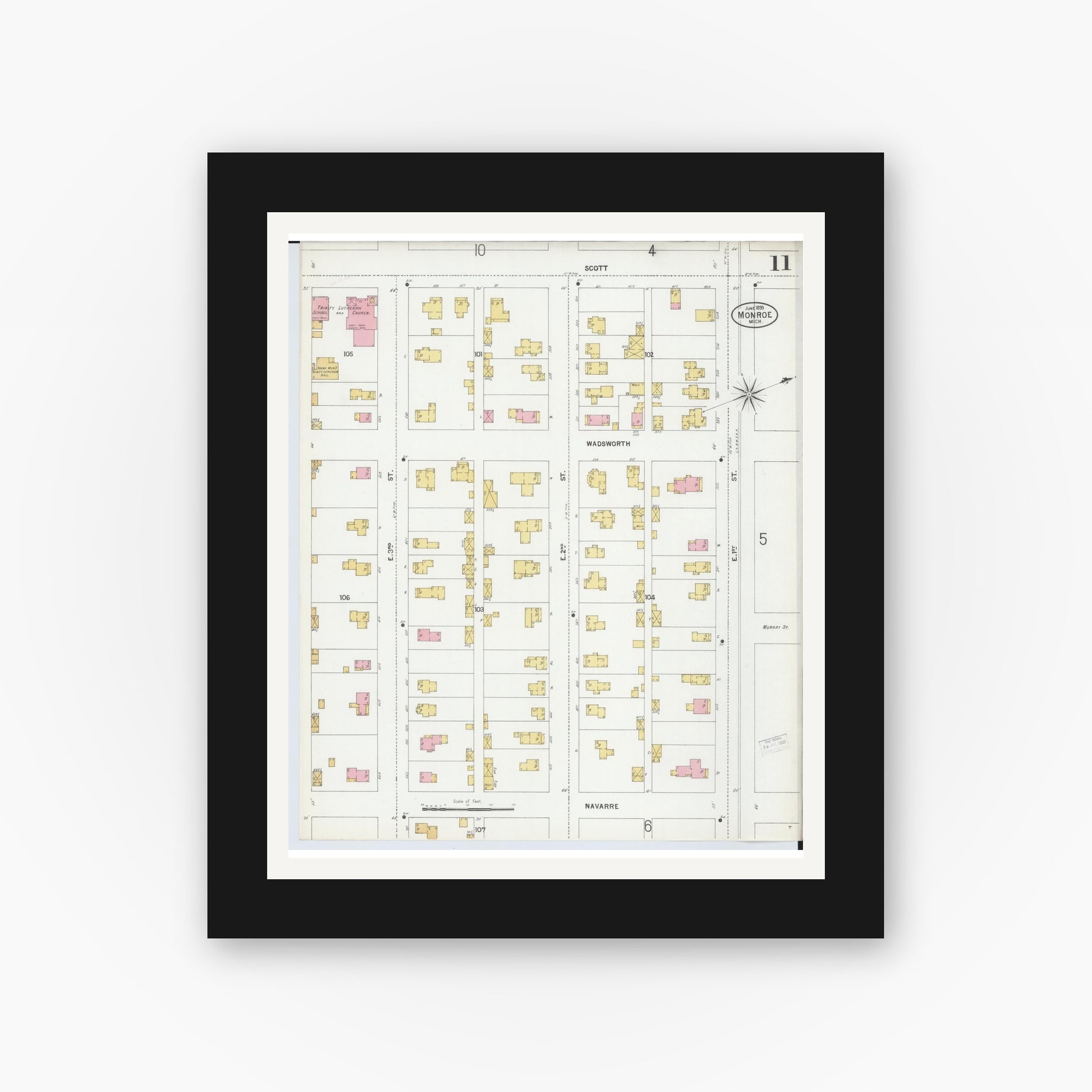 Old map wall art mockup — black gallery frame with white mat — Sanborn Fire Insurance Map from Monroe, Monroe County, Michigan (1899), Sheet #0011