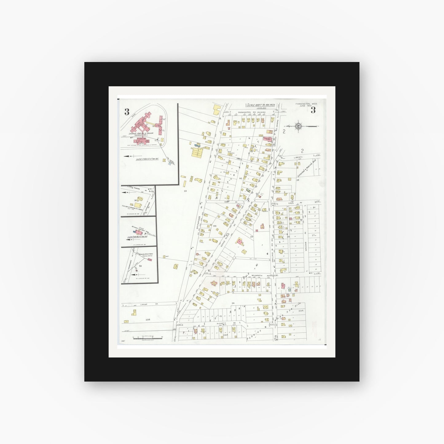Old map wall art mockup — black gallery frame with white mat — Sanborn Fire Insurance Map from Farmington, Oakland County, Michigan (1933), Sheet #0003