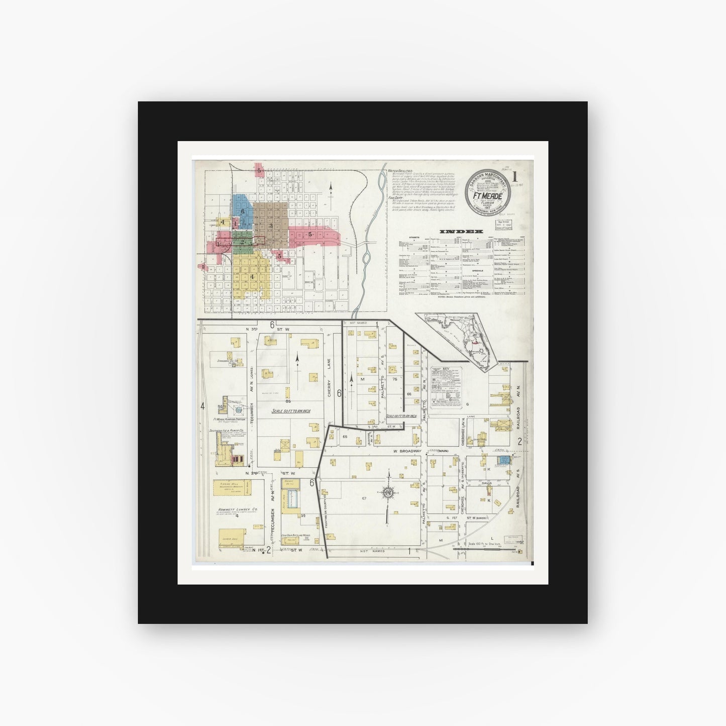Old map wall art mockup — black gallery frame with white mat — Sanborn Fire Insurance Map from Fort Meade, Polk County, Florida (1917), Sheet #0001
