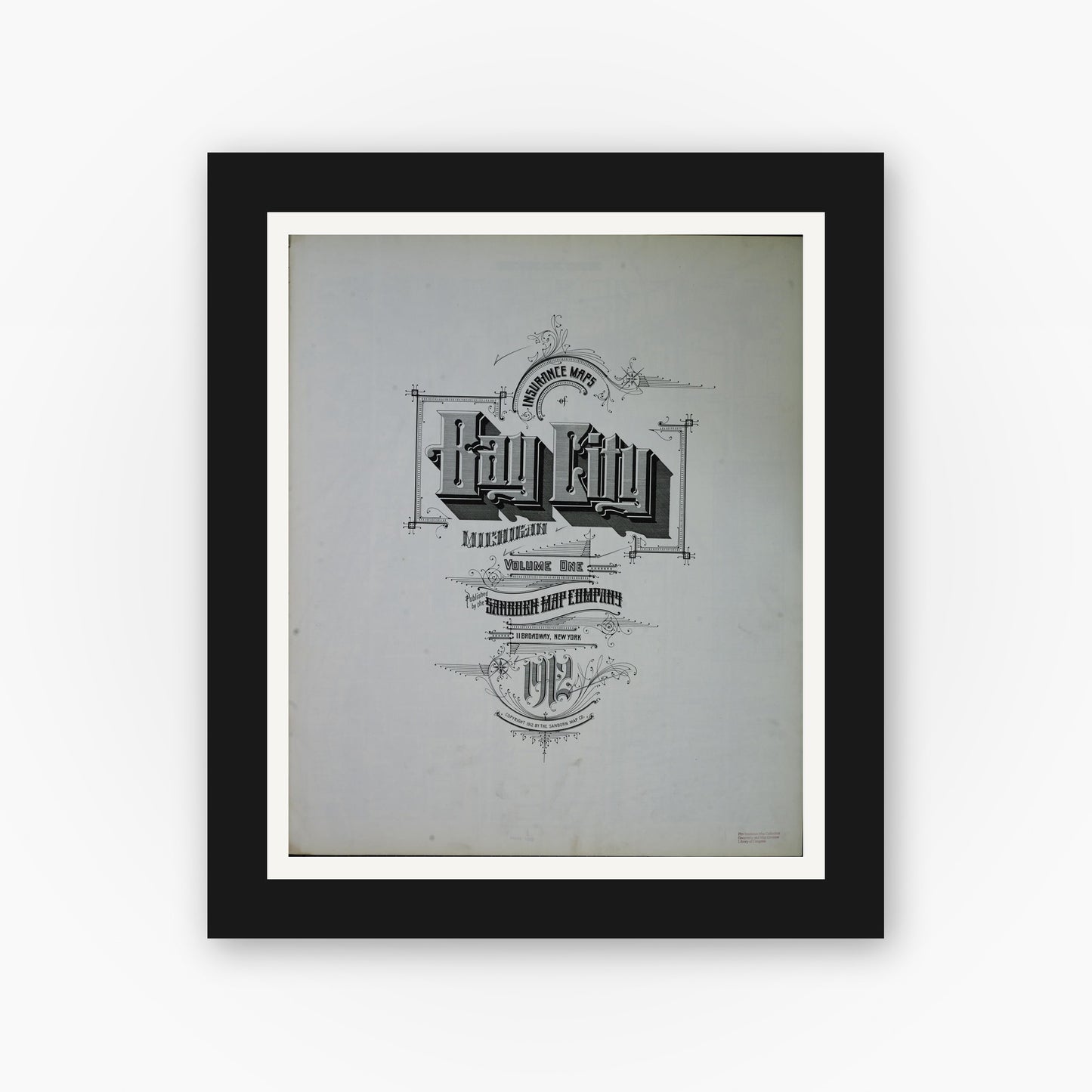 Old map wall art mockup — black gallery frame with white mat — Sanborn Fire Insurance Map from Bay City, Bay County, Michigan (1912), Sheet #0001