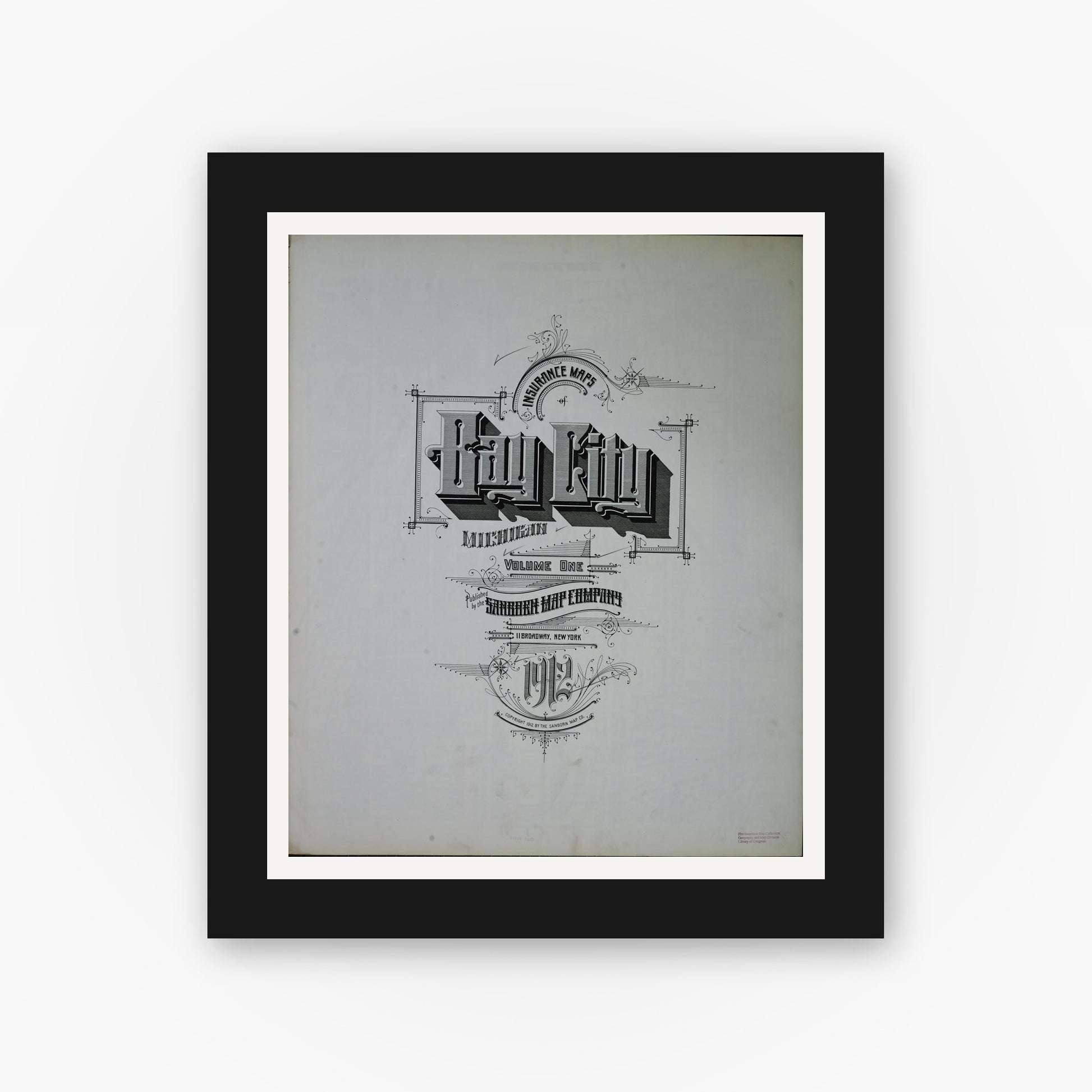 Old map wall art mockup — black gallery frame with white mat — Sanborn Fire Insurance Map from Bay City, Bay County, Michigan (1912), Sheet #0001