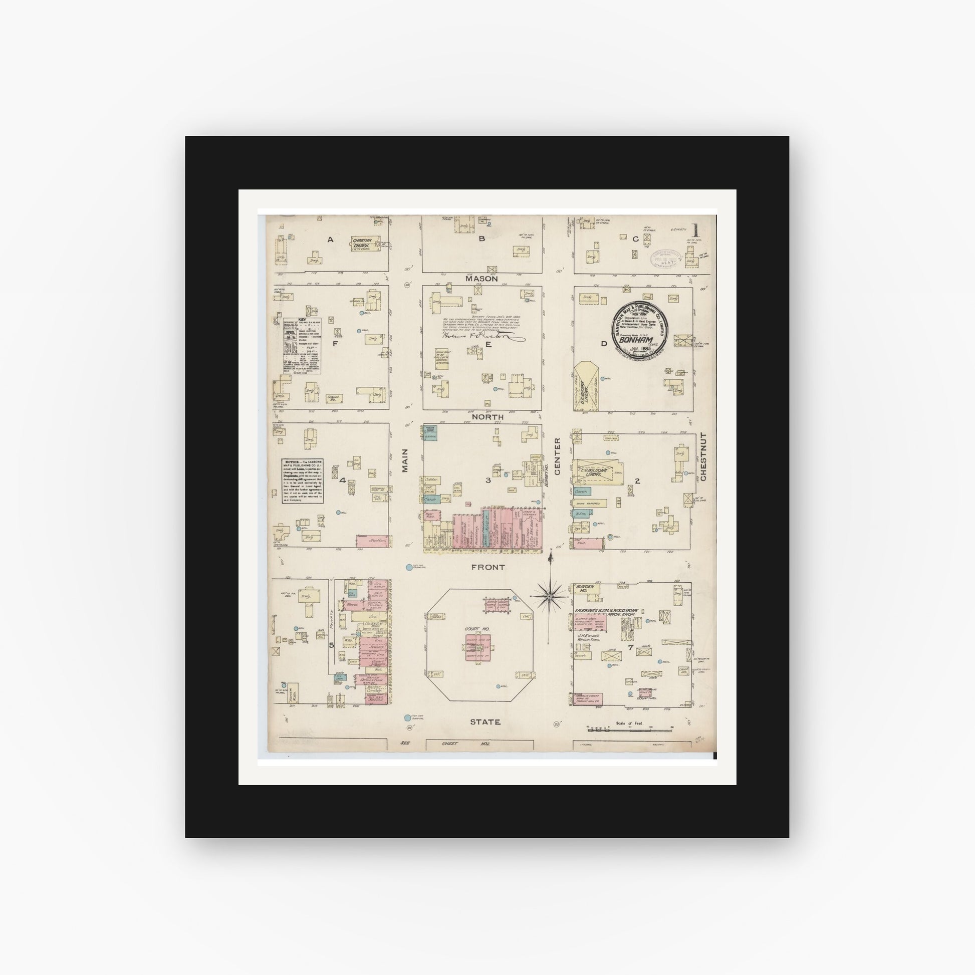 Old map wall art mockup — black gallery frame with white mat — Sanborn Fire Insurance Map from Bonham, Fannin County, Texas (1885), Sheet #0001
