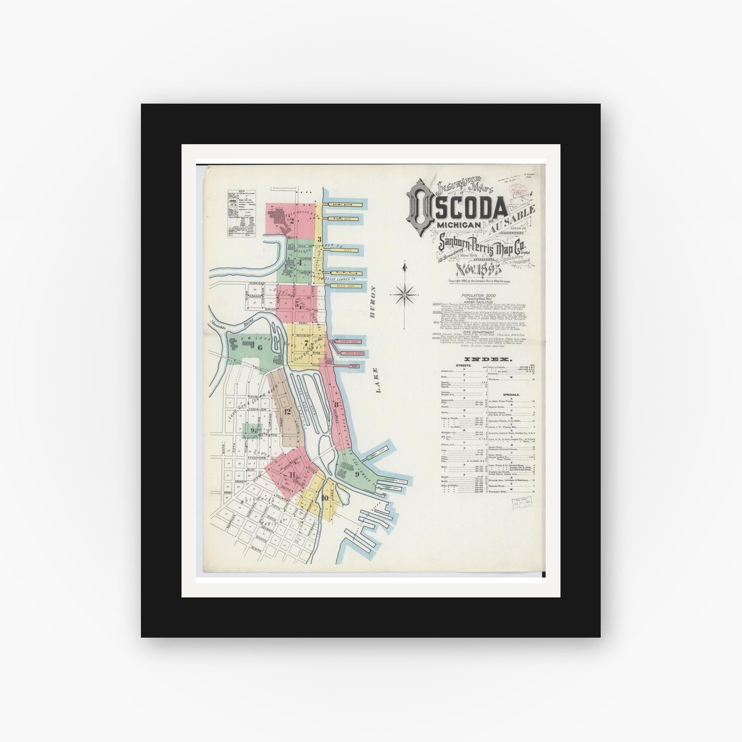 Old map wall art mockup — black gallery frame with white mat — Sanborn Fire Insurance Map from Oscoda, Iosco County, Michigan (1895), Sheet #0001