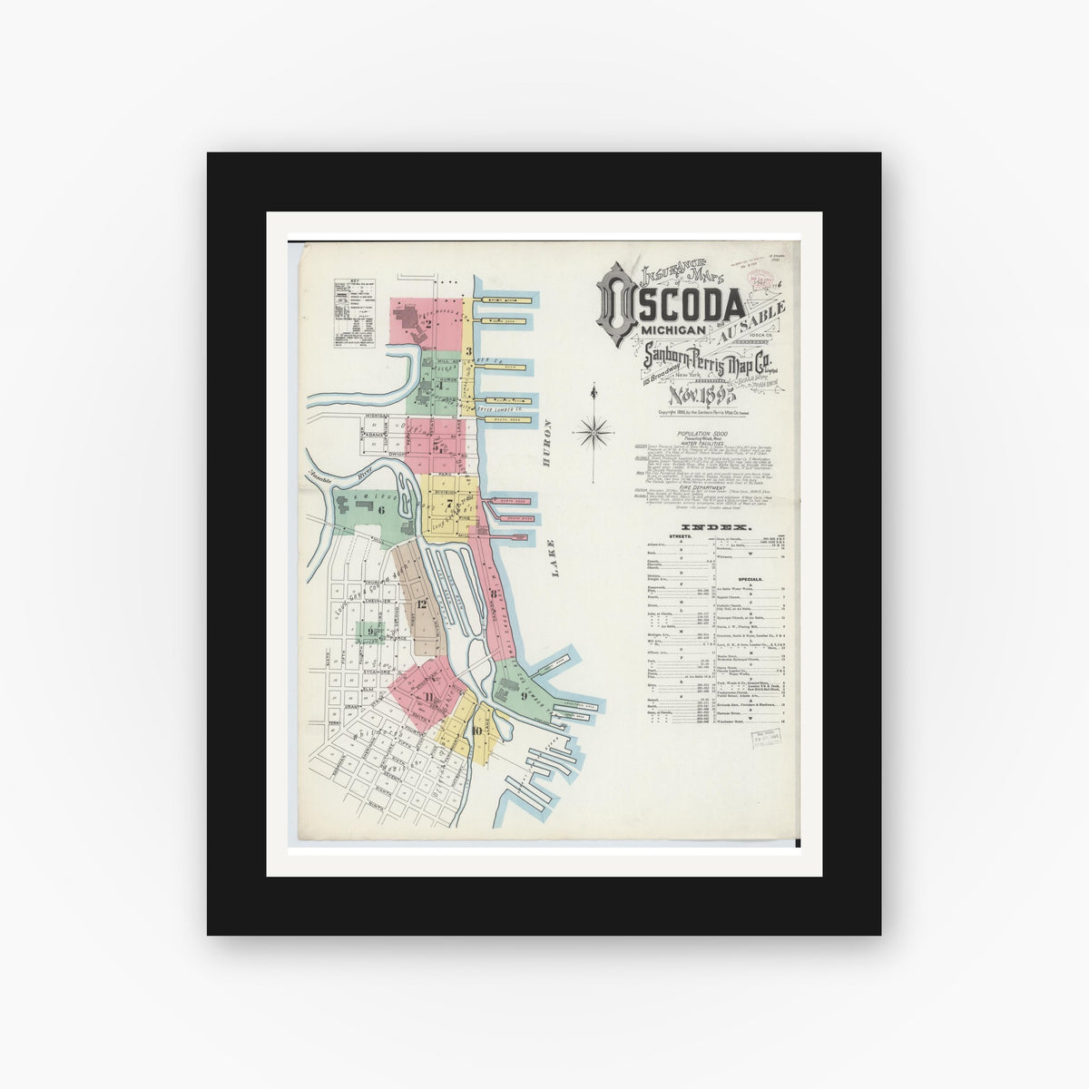 Old map wall art mockup — black gallery frame with white mat — Sanborn Fire Insurance Map from Oscoda, Iosco County, Michigan (1895), Sheet #0001