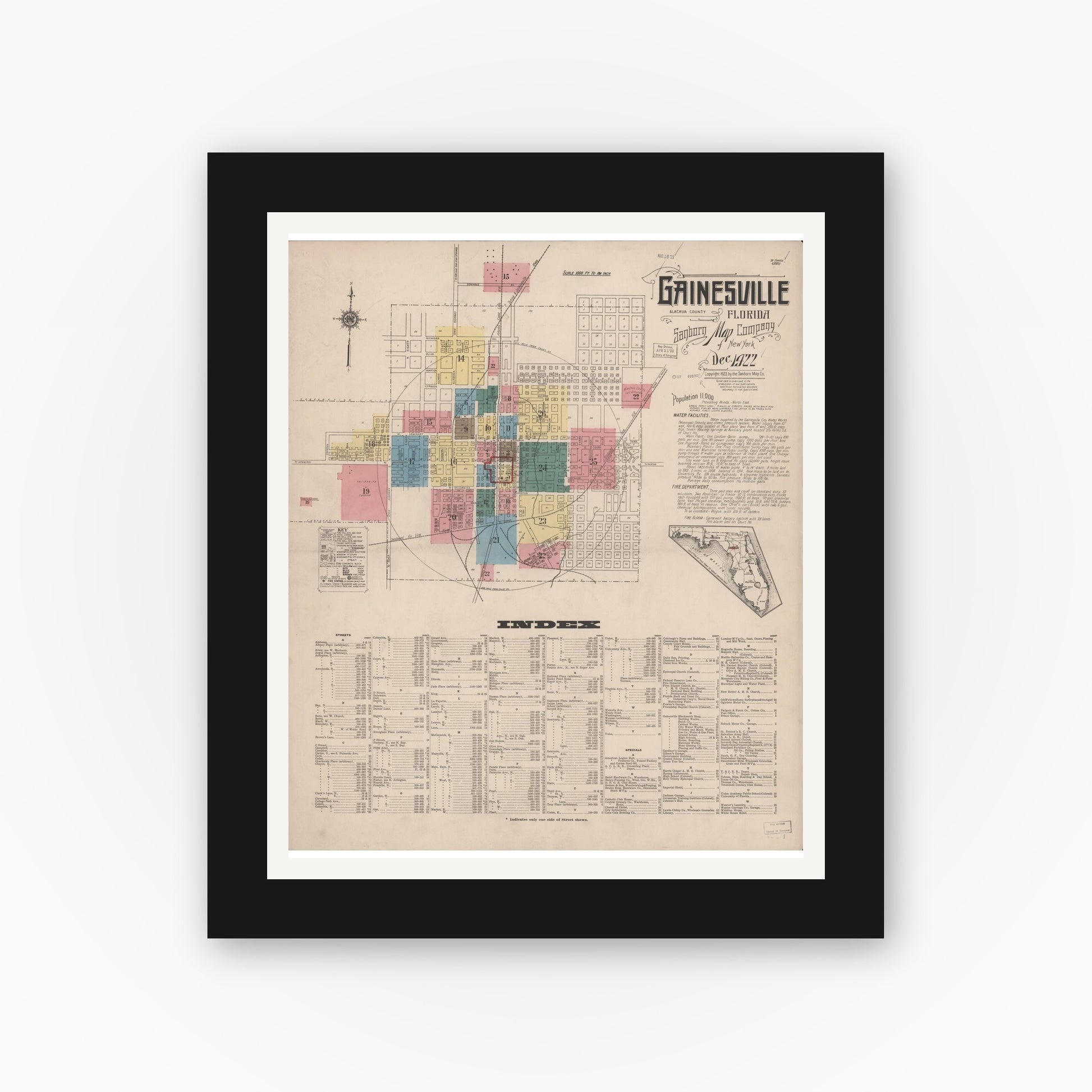 Old map wall art mockup — black gallery frame with white mat — Sanborn Fire Insurance Map from Gainesville, Alachua County, Florida (1922), Sheet #0001