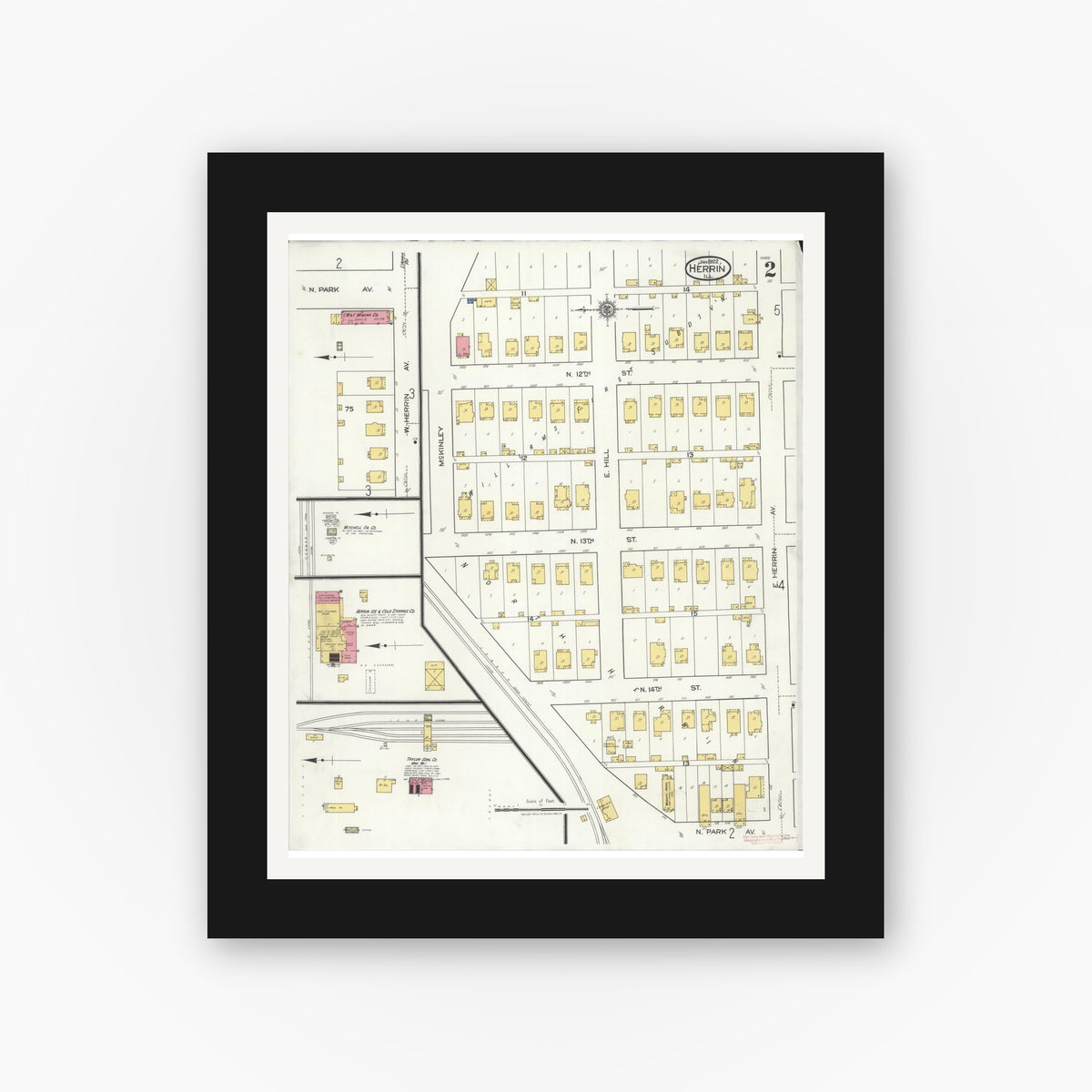 Old map wall art mockup — black gallery frame with white mat — Sanborn Fire Insurance Map from Herrin, Williamson County, Illinois (1922), Sheet #0002