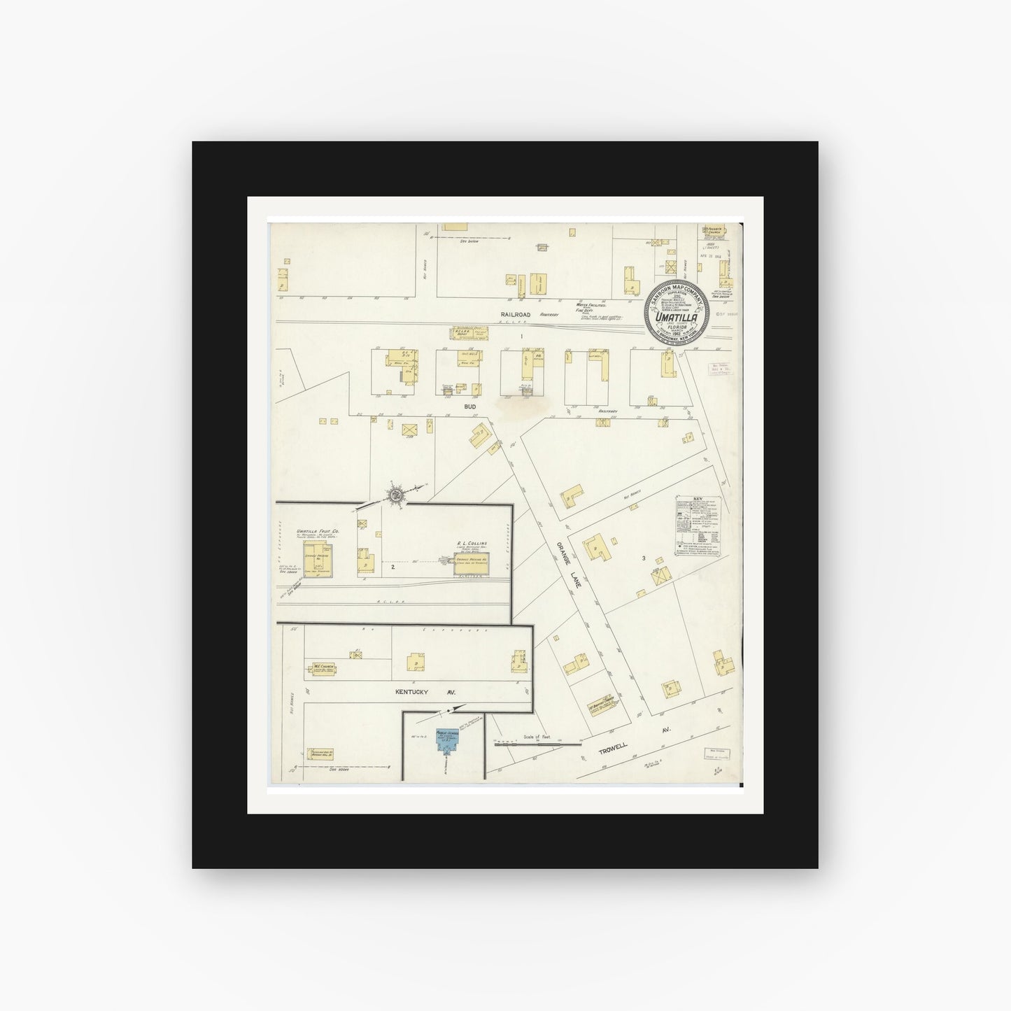 Old map wall art mockup — black gallery frame with white mat — Sanborn Fire Insurance Map from Umatilla, Lake County, Florida (1912), Sheet #0001