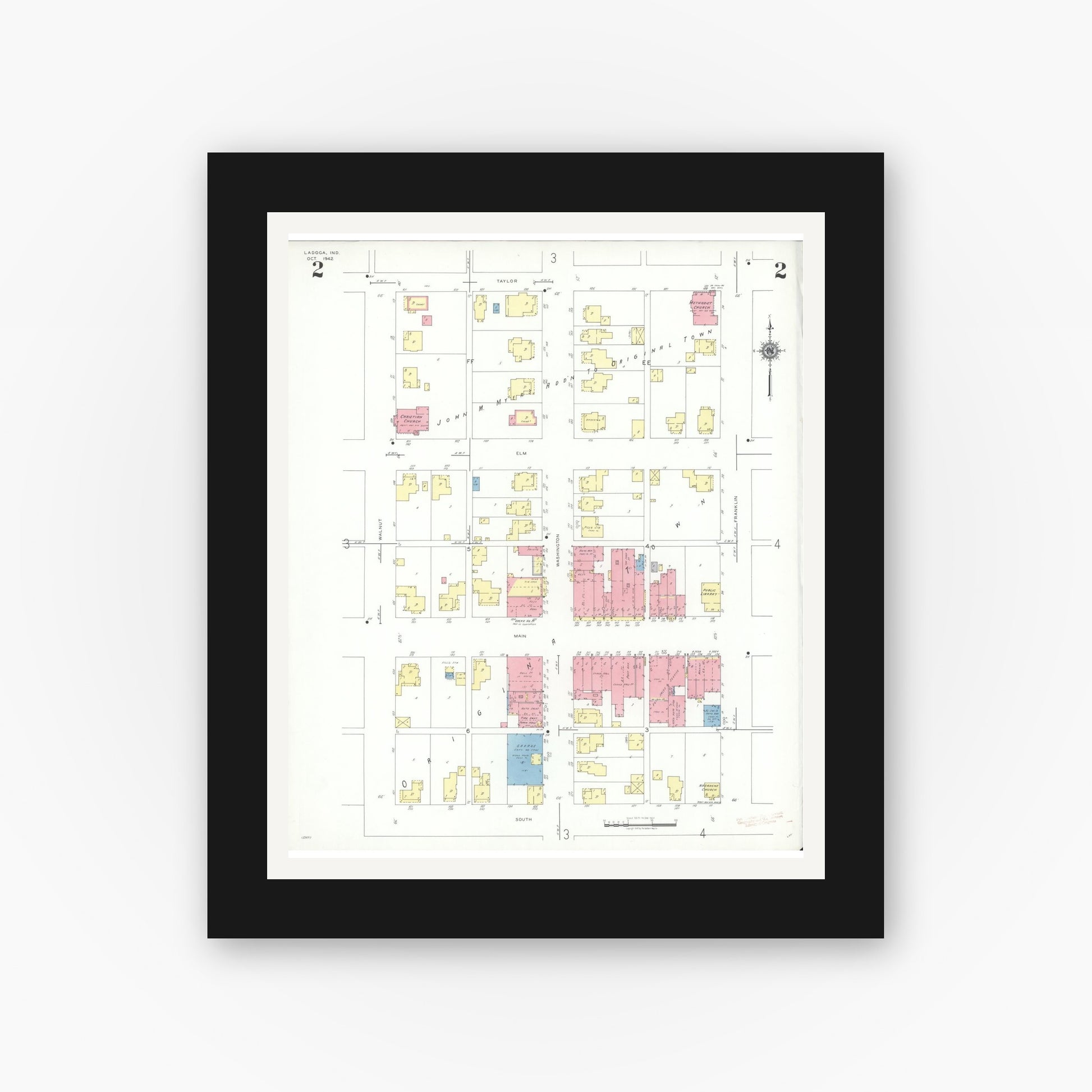 Old map wall art mockup — black gallery frame with white mat — Sanborn Fire Insurance Map from Ladoga, Montgomery County, Indiana (1942), Sheet #0002