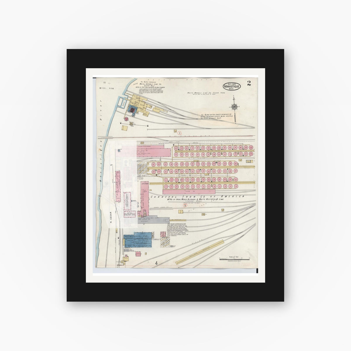 Old map wall art mockup — black gallery frame with white mat — Sanborn Fire Insurance Map from Manistique, Schoolcraft County, Michigan (1950), Sheet #0002