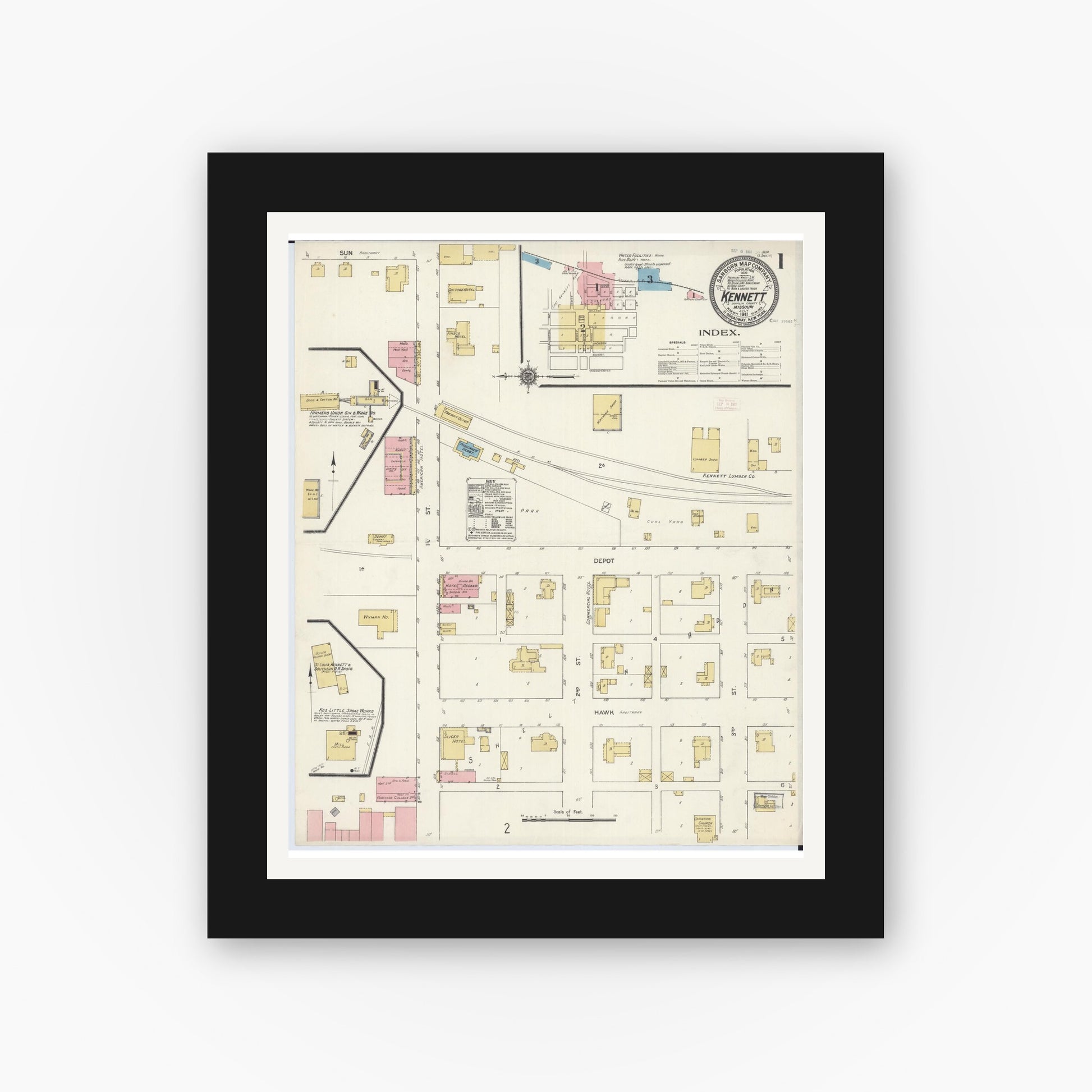 Old map wall art mockup — black gallery frame with white mat — Sanborn Fire Insurance Map from Kennett, Dunklin County, Missouri (1911), Sheet #0001