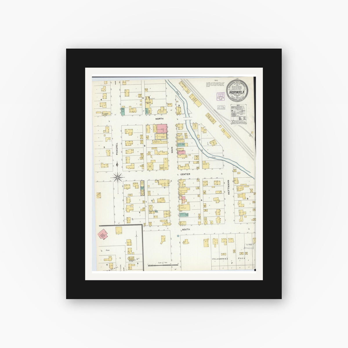 Old map wall art mockup — black gallery frame with white mat — Sanborn Fire Insurance Map from Norwalk, Monroe County, Wisconsin (1904), Sheet #0001