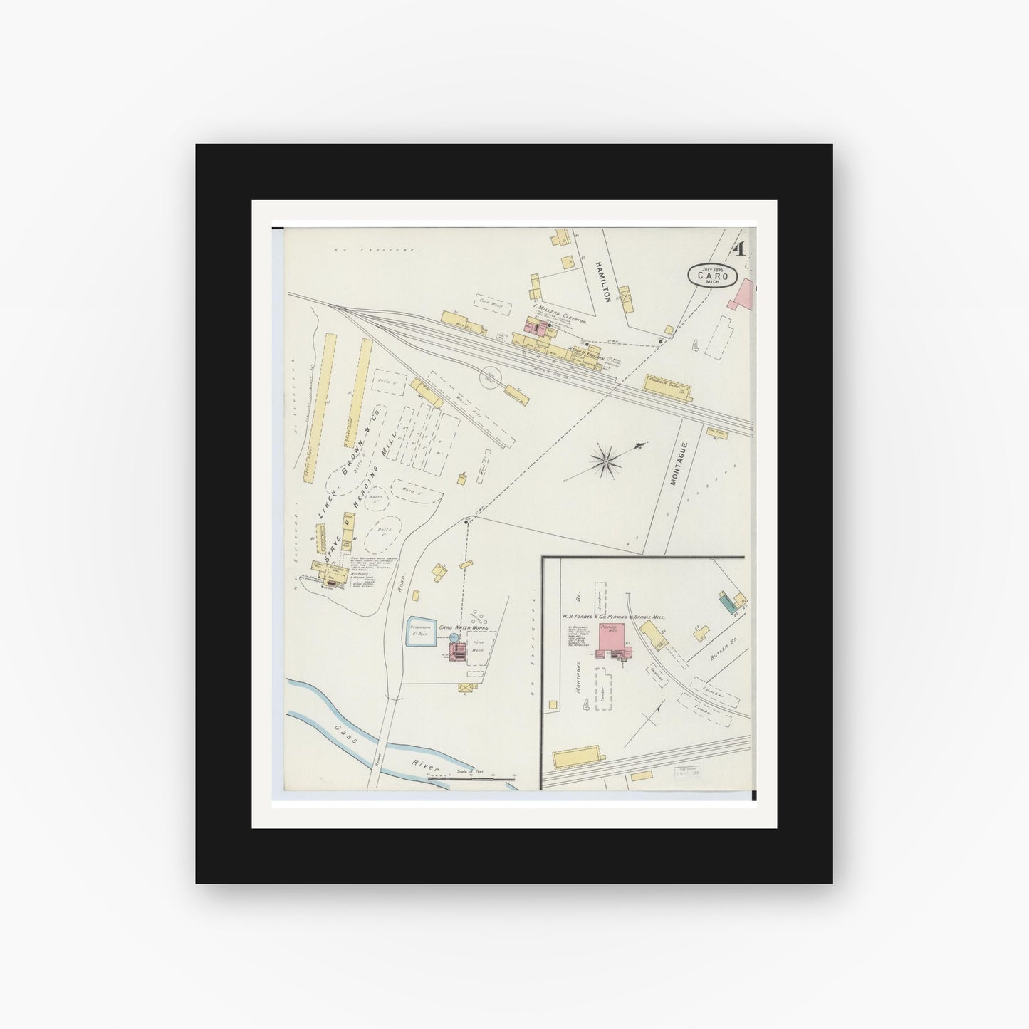 Old map wall art mockup — black gallery frame with white mat — Sanborn Fire Insurance Map from Caro, Tuscola County, Michigan (1895), Sheet #0004